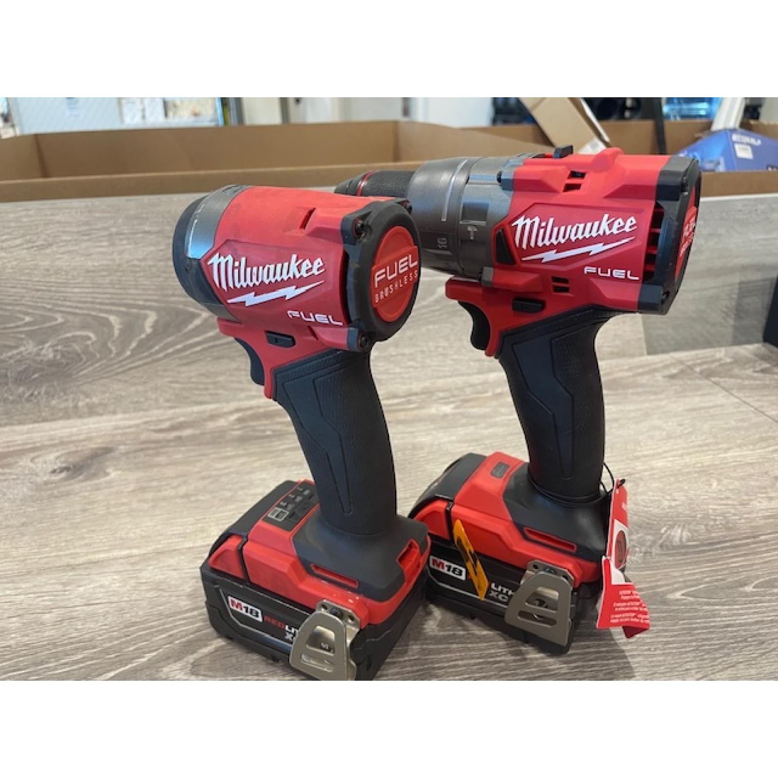 AS-IS Milwaukee FUEL 18V Lithium-Ion Brushless Cordless Hammer Drill and Impact Driver Combo Kit