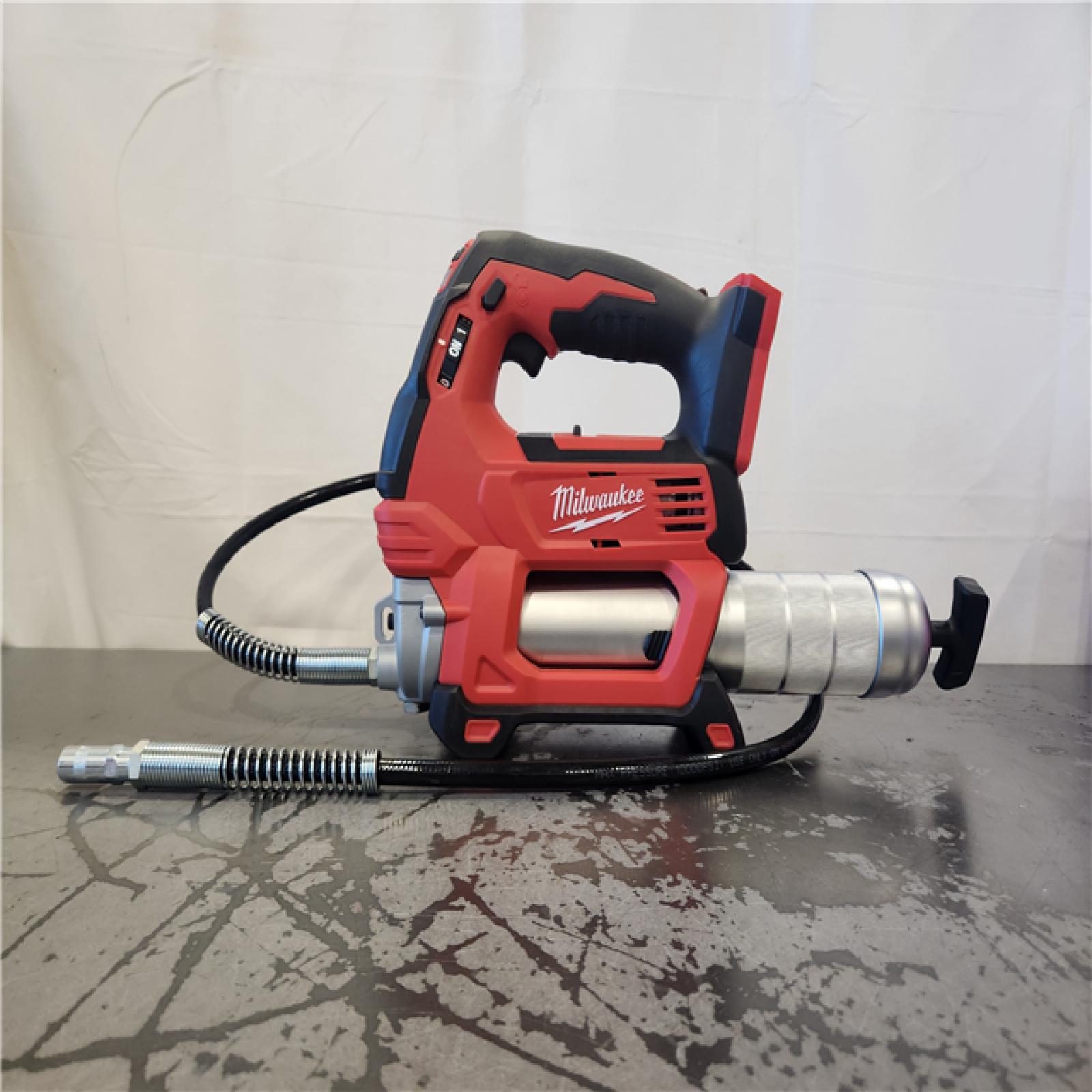 AS-IS- Milwaukee M18 18-Volt Lithium-Ion Cordless Grease Gun 2-Speed (Tool-Only)
