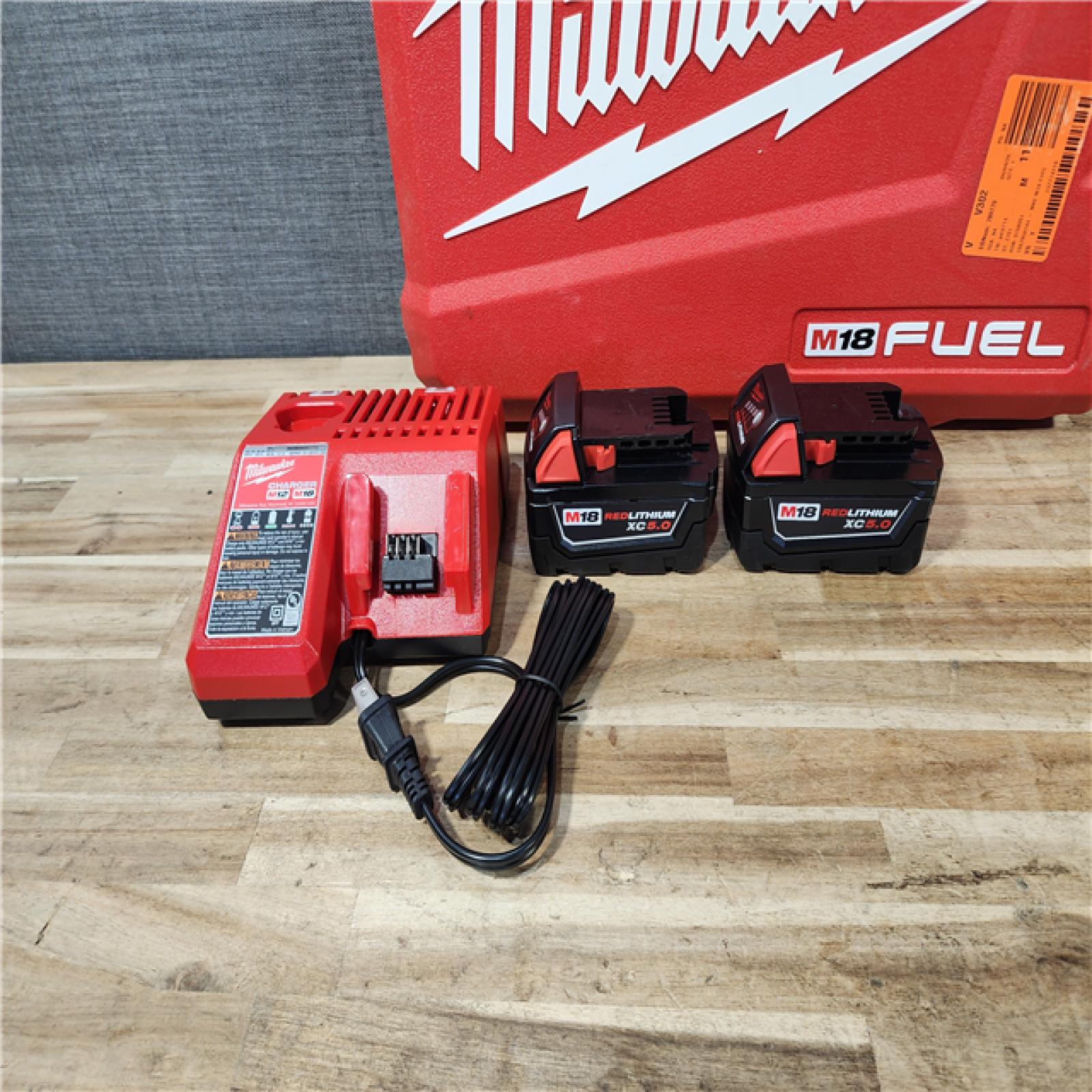 HOUSTON LOCATION - AS-IS Milwaukee 2 Tool Combo Kit W/ (2) Battery & Charger