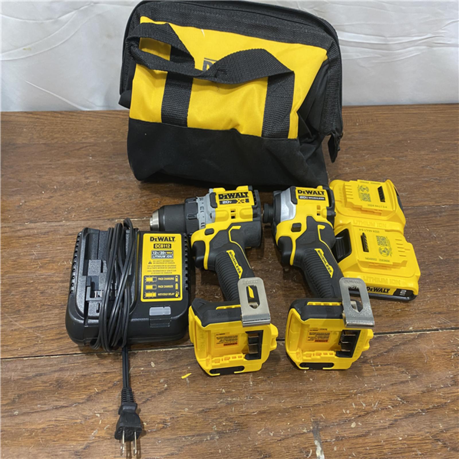 AS-IS DEWALT 20V MAX XR Cordless Drill/Driver, ATOMIC Impact Driver 2 Tool Combo Kit, (2) 2.0Ah Batteries, Charger, and Bag