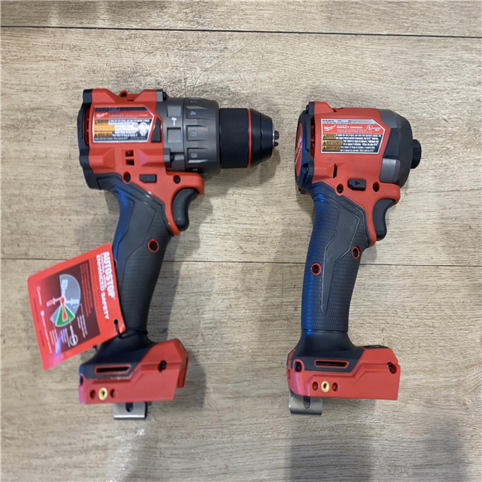 AS-IS Milwaukee FUEL 18V Lithium-Ion Brushless Cordless Hammer Drill and Impact Driver Combo Kit