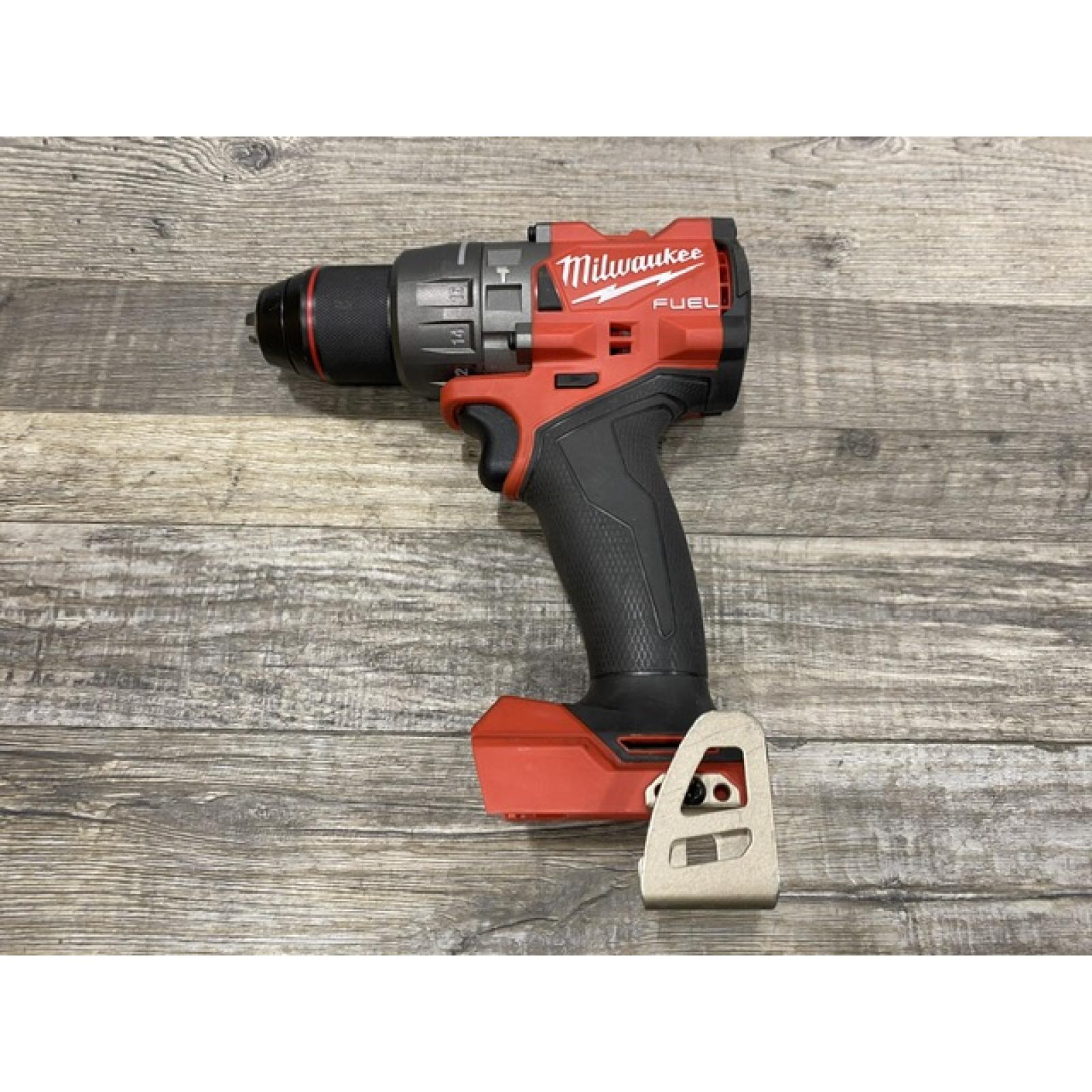 AS-IS Milwaukee FUEL 18V Lithium-Ion Brushless Cordless 1/2 in. Hammer Drill Driver Kit