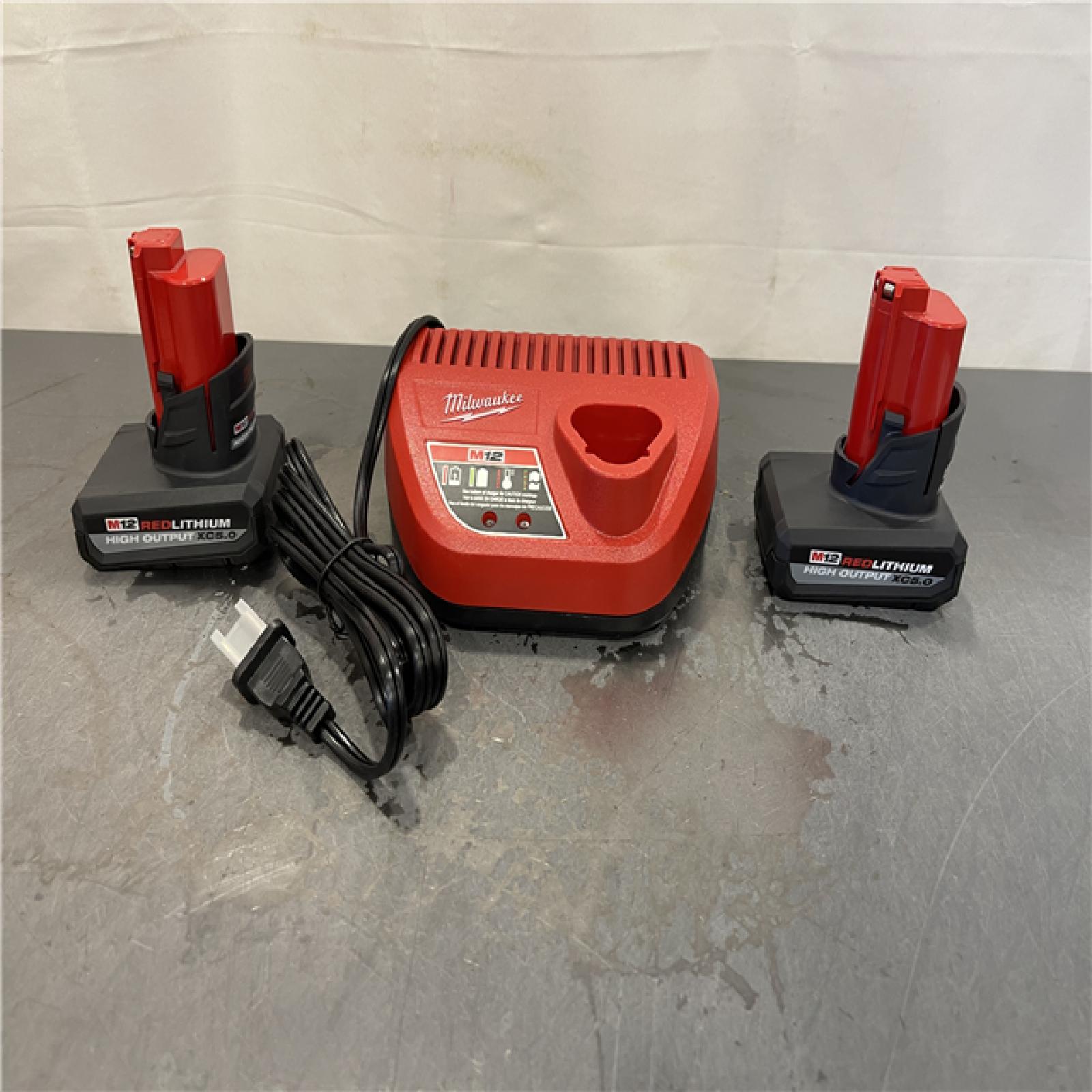 AS-IS - Milwaukee M12 12V Lithium-Ion XC High Output 5.0 Ah Battery Pack (2-Pack) Starter Kit with Charger