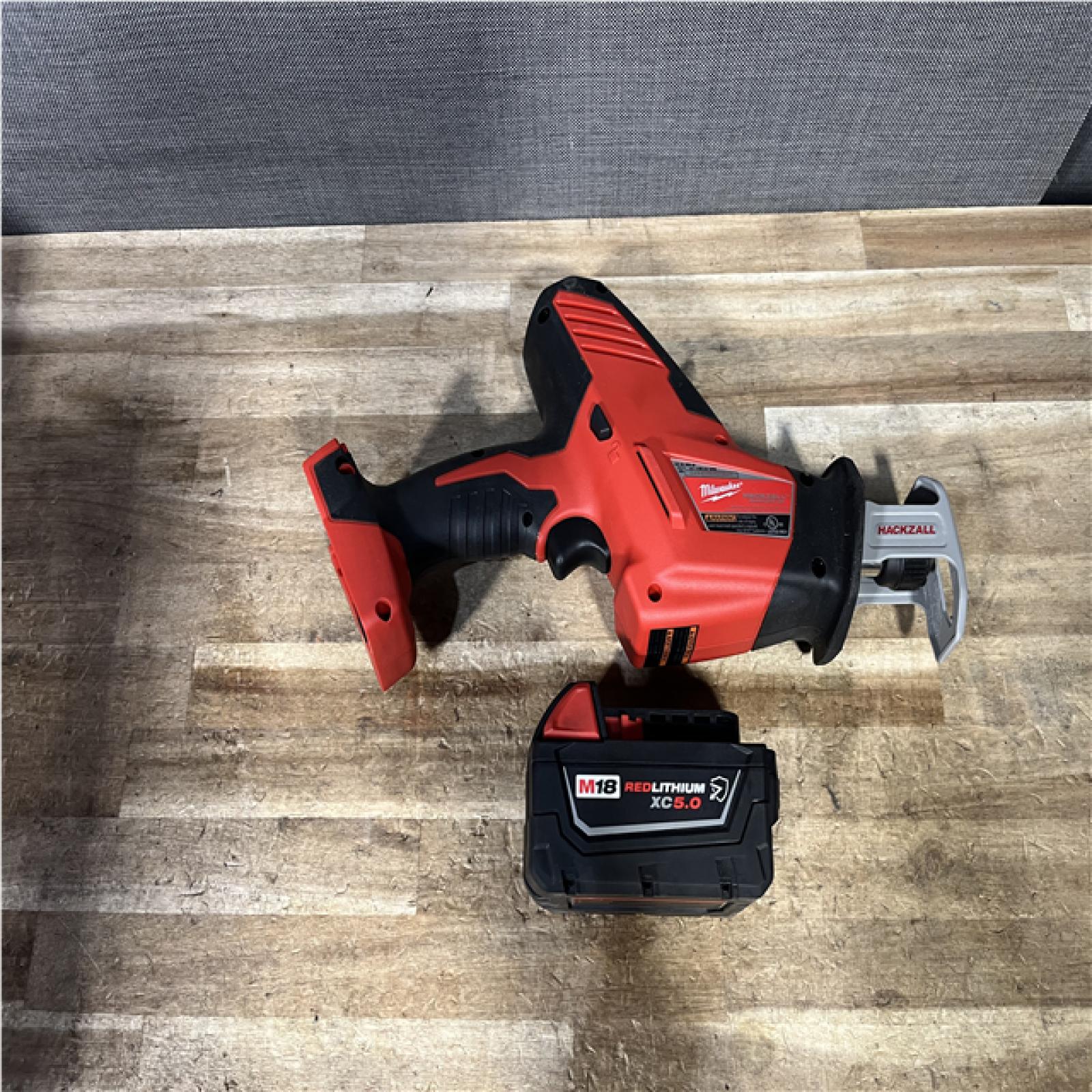 Houston Location AS-IS Milwaukee 18V Lithium-Ion Cordless HACKZALL Reciprocating Saw and Battery