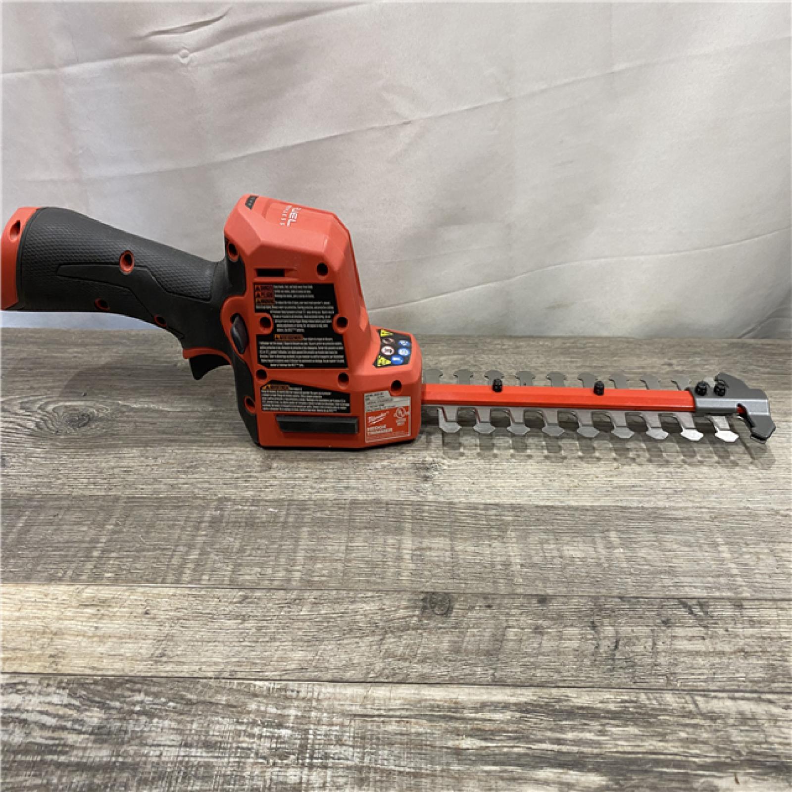 AS-IS Milwaukee FUEL 8 in. 12V Lithium-Ion Brushless Cordless Battery Hedge Trimmer (Tool-Only)