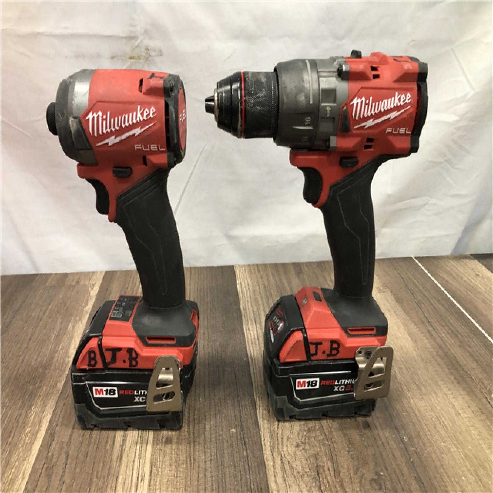 AS-IS Milwaukee FUEL 18V Lithium-Ion Brushless Cordless Hammer Drill and Impact Driver