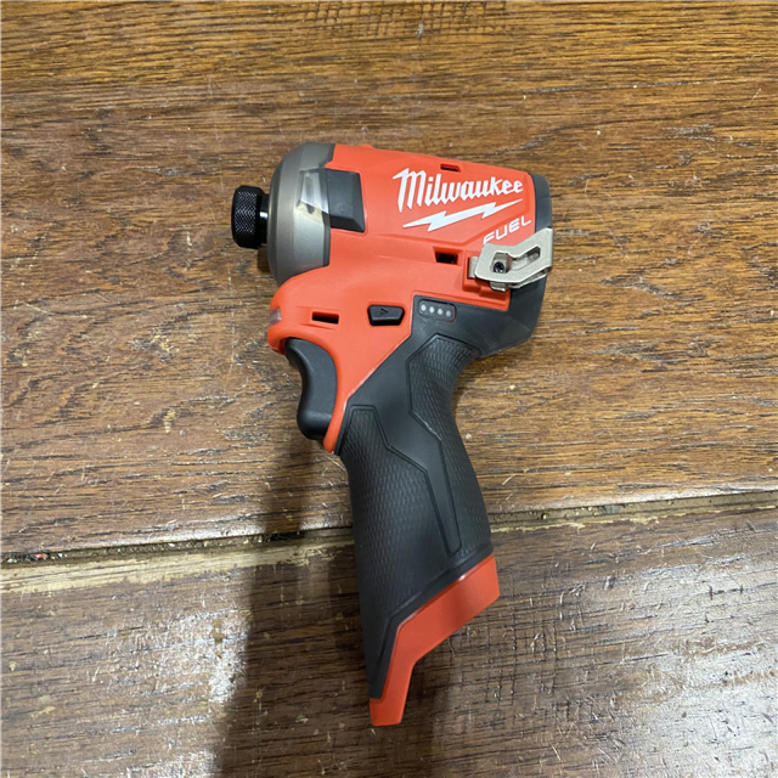 AS-IS M12 FUEL SURGE 12V Lithium-Ion Brushless Cordless 1/4 in. Hex Impact Driver Compact Kit W/Two 2.0Ah Batteries, Bag