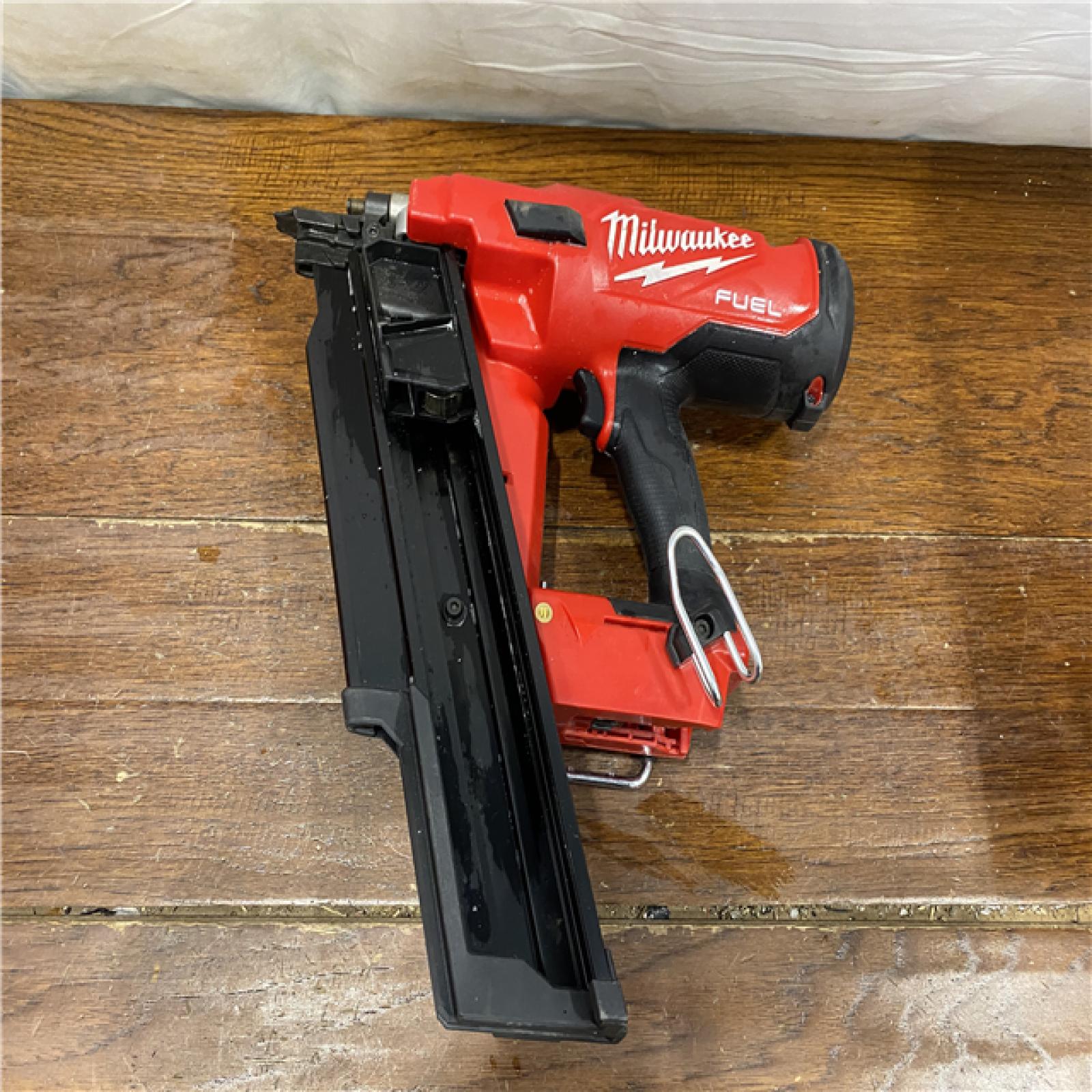 AS-IS Milwaukee 2744-20 M18 FUEL 3-1/2 in. 18-Volt 21-Degree Lithium-Ion Brushless Cordless Framing Nailer (Tool-Only)