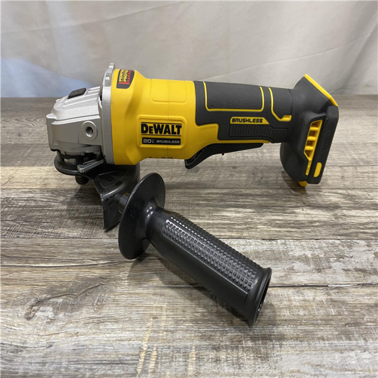 AS-IS DEWALT 20V MAX Cordless Brushless 4-1/2 in. Angle Grinder with Paddle Switch (Tool Only)