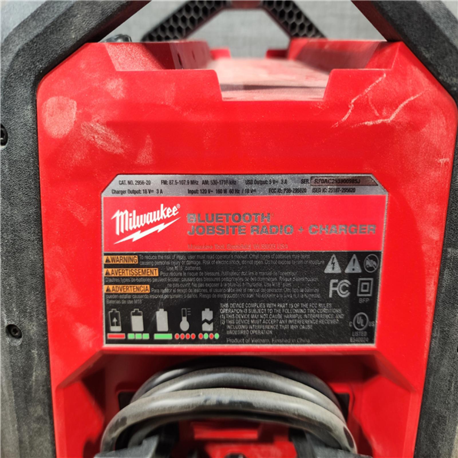 HOUSTON LOCATION - AS - IS Milwaukee Lithium-Ion Cordless PACKOUT Jobsite Radio/Speaker with Built-In Charger