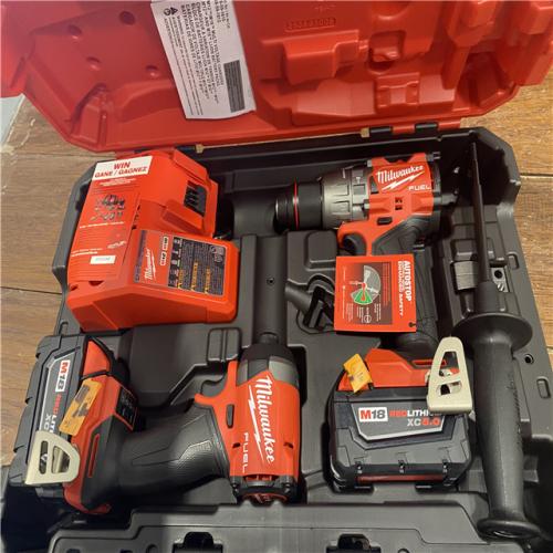 AS-IS MILWAUKEE M18 FUEL 18V Lithium-Ion Brushless Cordless Hammer Drill and Impact Driver Combo Kit (2-Tool) with 2 Batteries