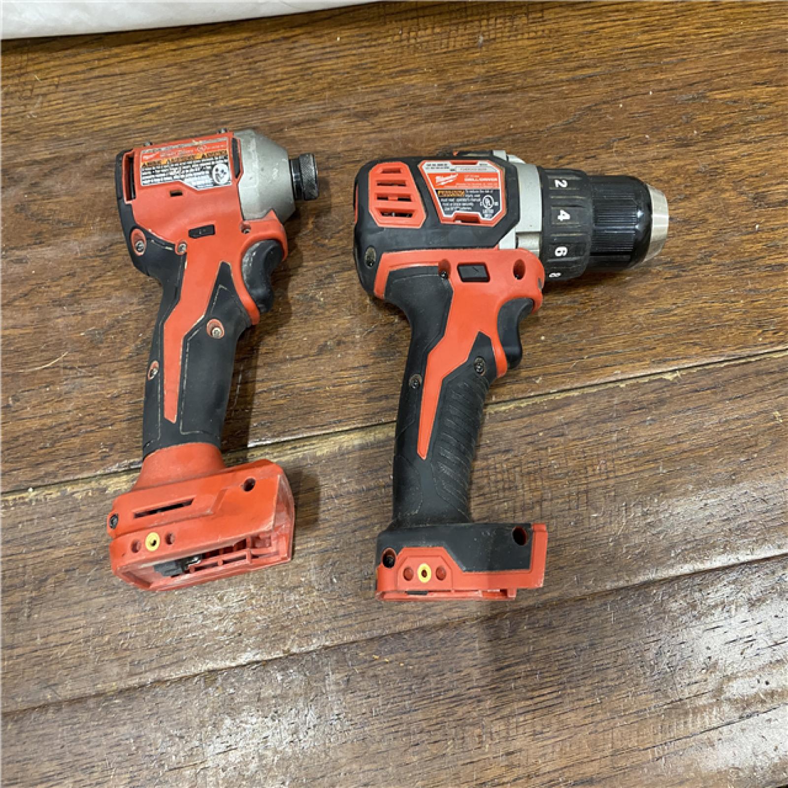 AS-IS MILWAUKEE M18 FUEL 18V Lithium-Ion Brushless Cordless Hammer Drill and Impact Driver Combo Kit (2-Tool) with 2 Batteries