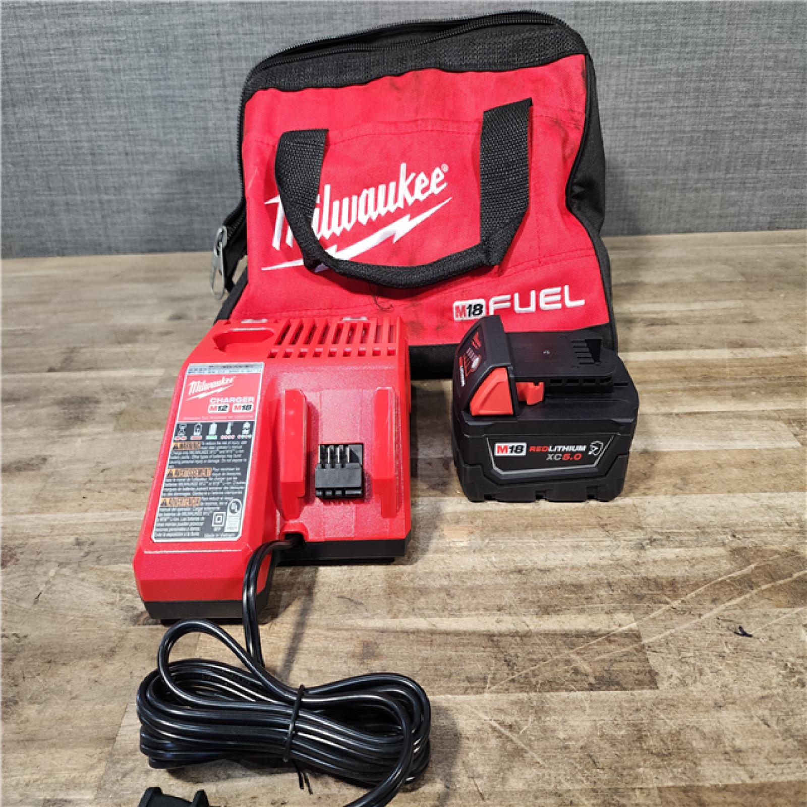 HOUSTON LOCATION - AS-IS Milwaukee M18 FUEL 18V Lithium-Ion Brushless Cordless 1/2 in. Impact Wrench w/Friction Ring Kit