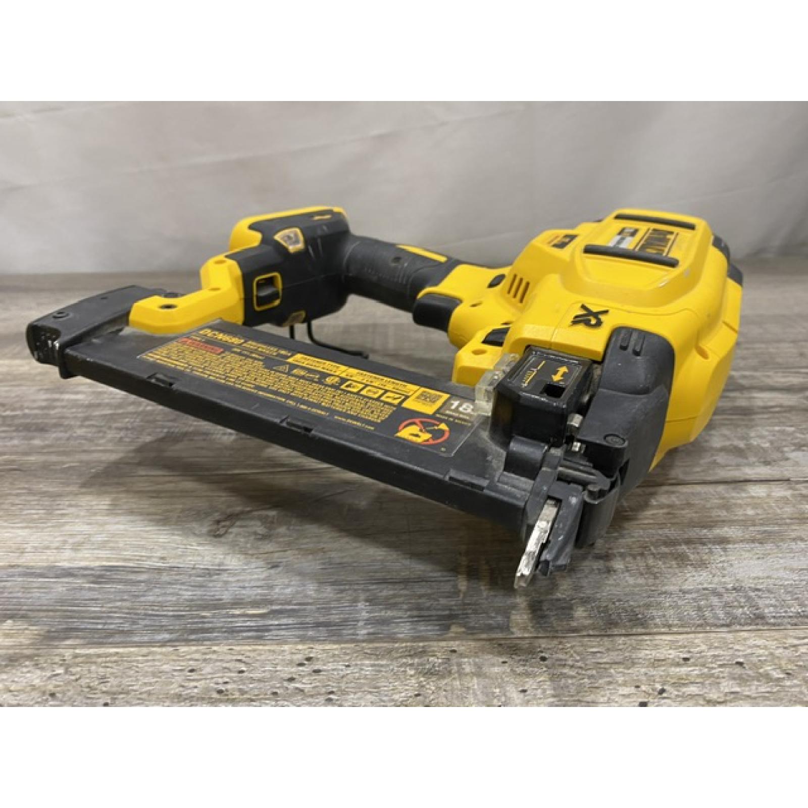 AS-IS DEWALT 20V MAX XR Lithium-Ion Electric Cordless 18-Gauge Brad Nailer (Tool Only)
