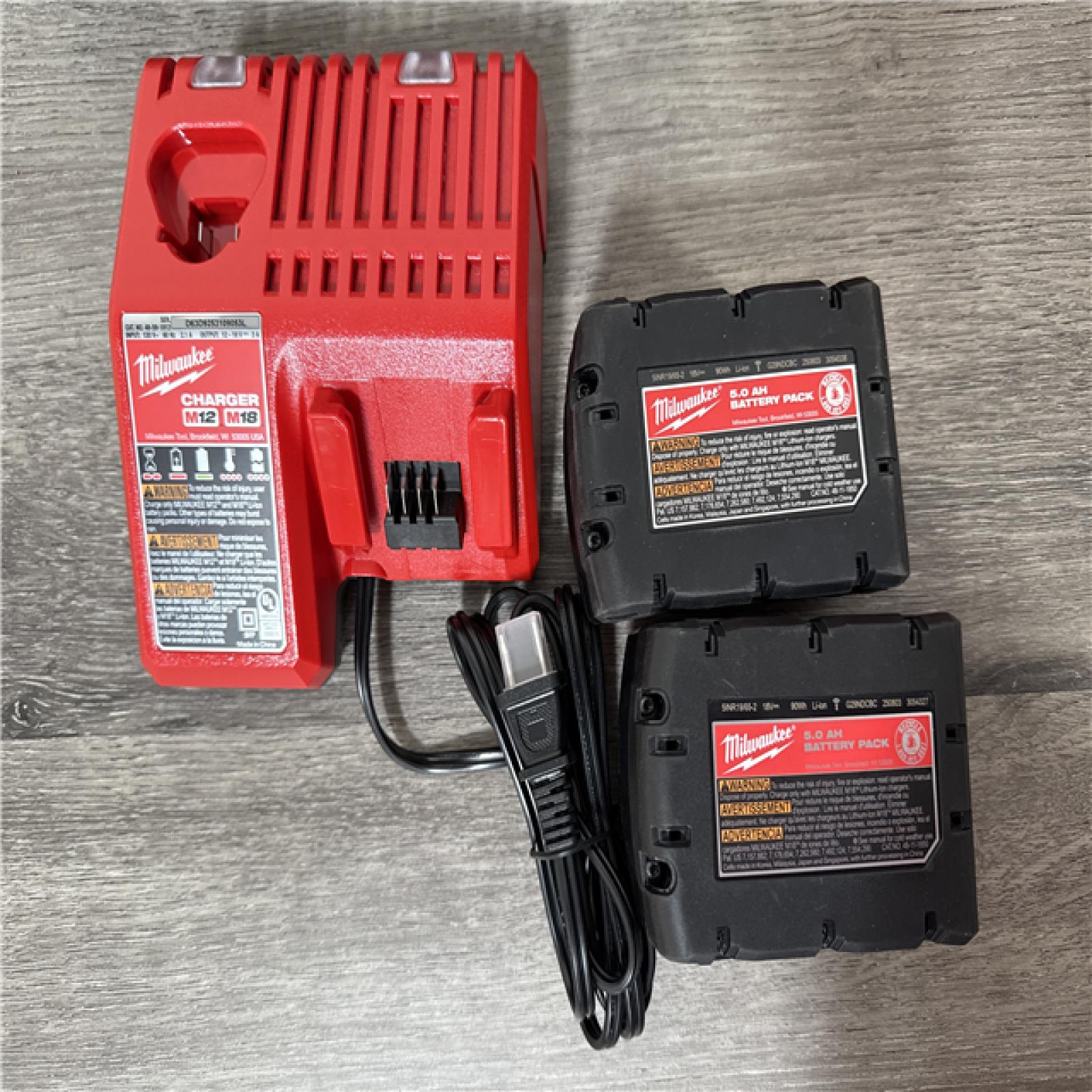 California AS-IS Milwaukee M18 Fuel 5-Tool Combo Kit  Includes (2) Batteries  Charger & Bag