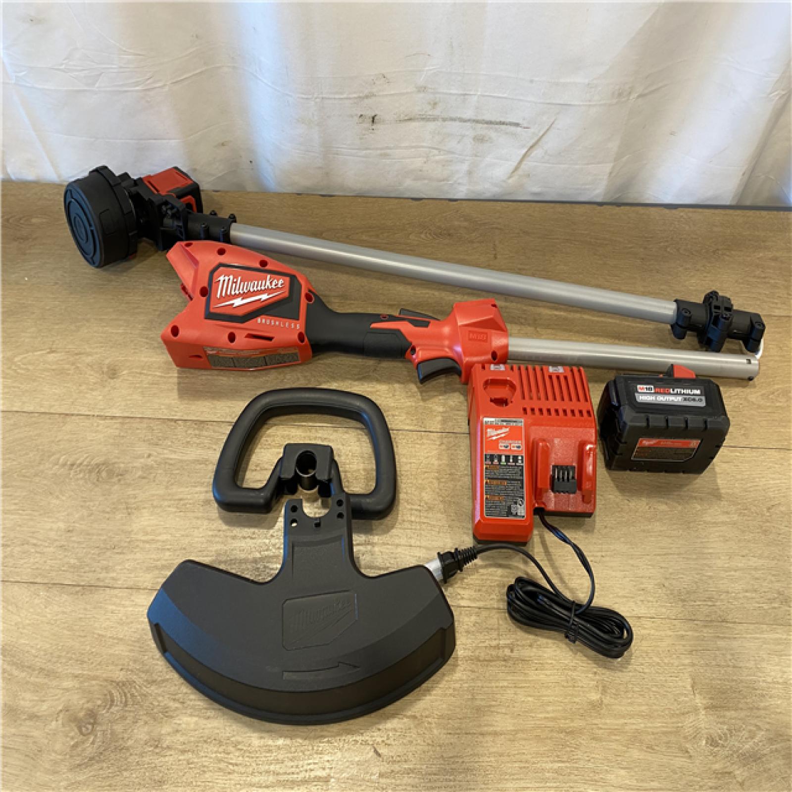 AS-IS Milwaukee 18V M18 Lithium-Ion Brushless Cordless String Trimmer Kit