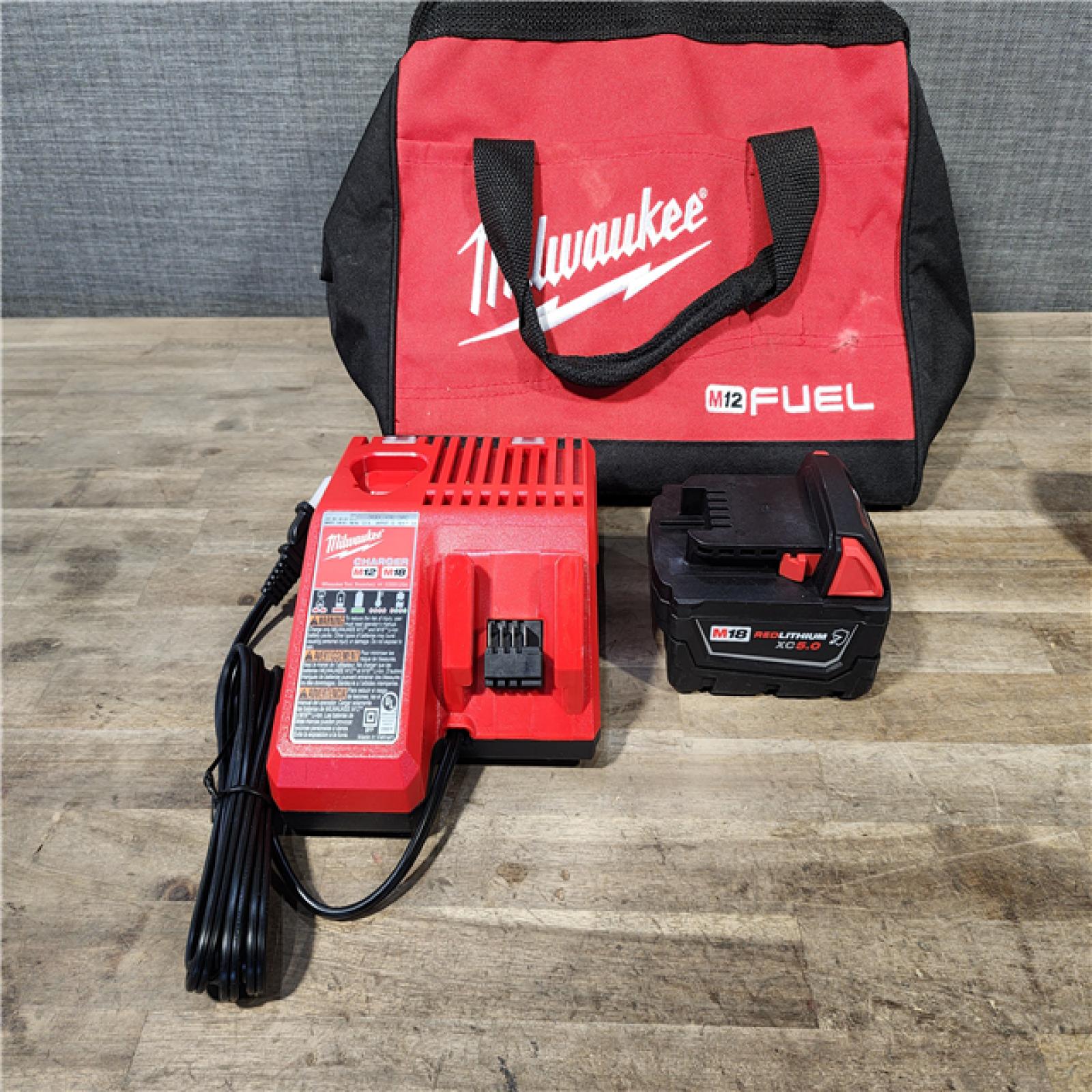 HOUSTON LOCATION - AS-IS (APPEARS LIKE NEW) Milwaukee M18 1/2 in. Cordless Brushless High Torque Impact Wrench Kit (Battery & Charger)