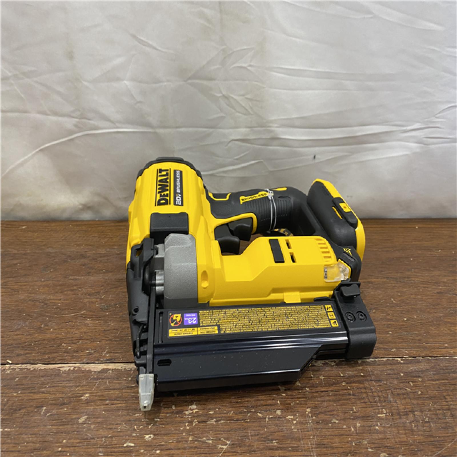 AS-IS DEWALT ATOMIC 20V MAX Lithium Ion Cordless 23 Gauge Pin Nailer Kit with 3.0Ah Battery and Charger