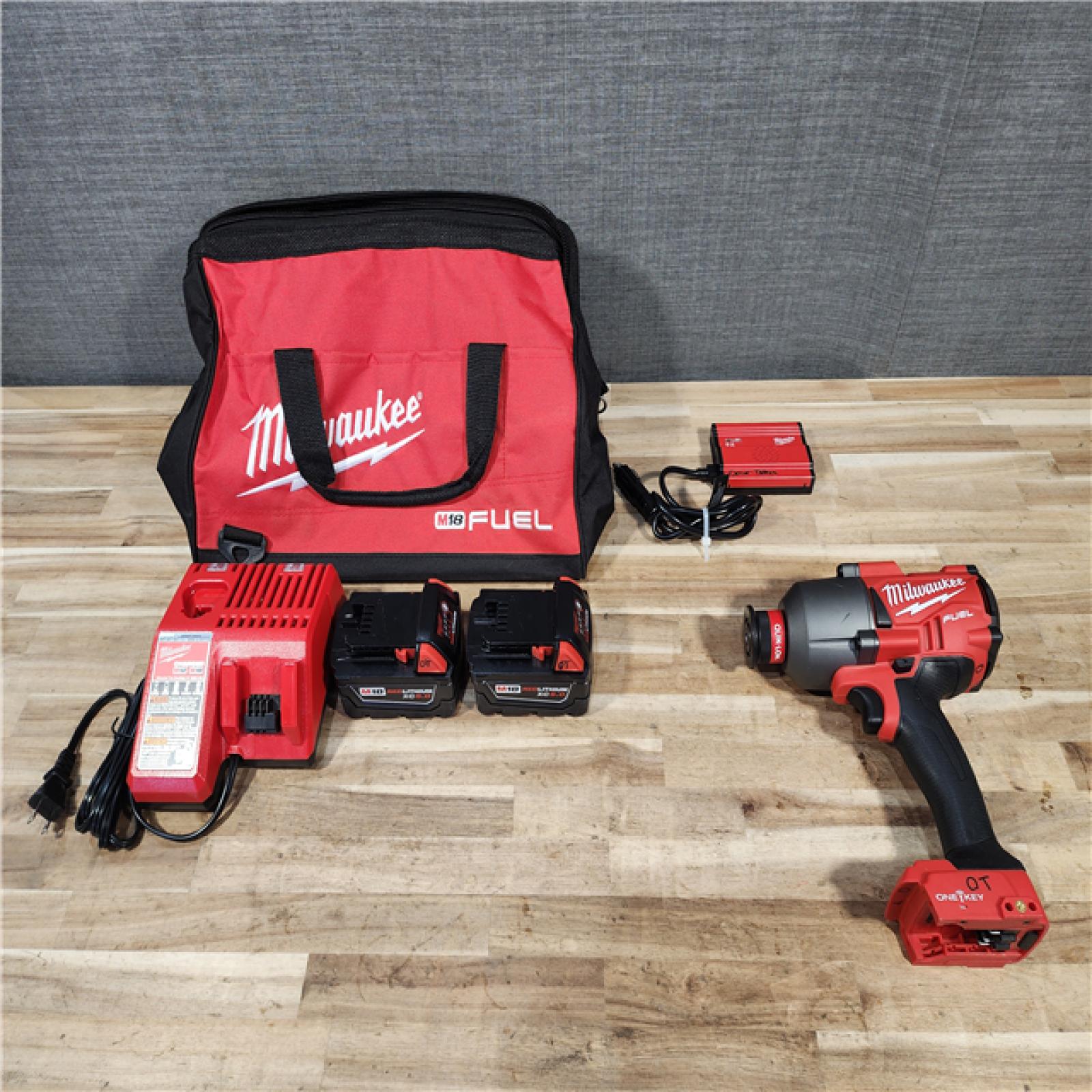 HOUSTON LOCATION - AS-IS Milwaukee 2865-22 M18 FUEL 7/16 in. Hex Utility High-Torque Impact Wrench Kit