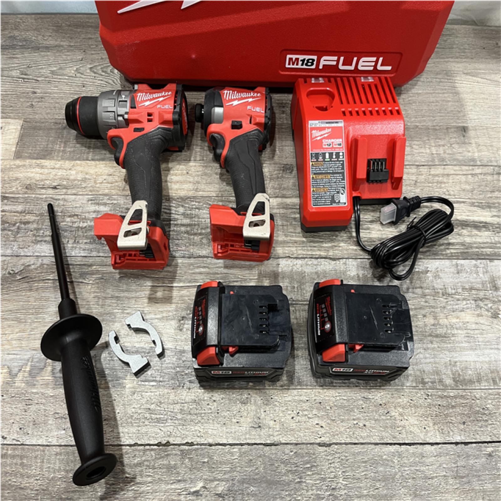 AS-IS Milwaukee FUEL 18V Lithium-Ion Brushless Cordless Hammer Drill and Impact Driver Combo Kit
