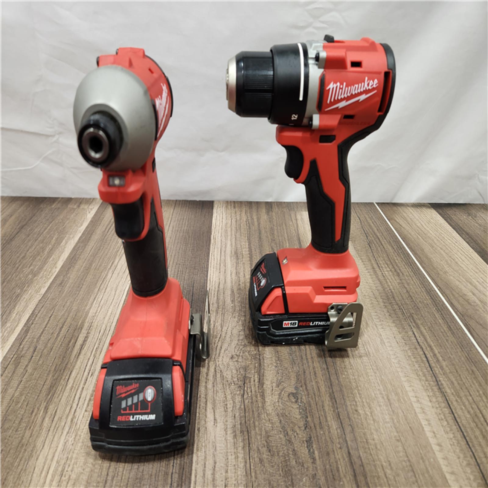 AS-IS  Milwaukee M18 18V Lithium-Ion Brushless Cordless Compact Drill/Impact Combo Kit (2-Tool) W/(2) 2.0 Ah Batteries, Charger & Bag