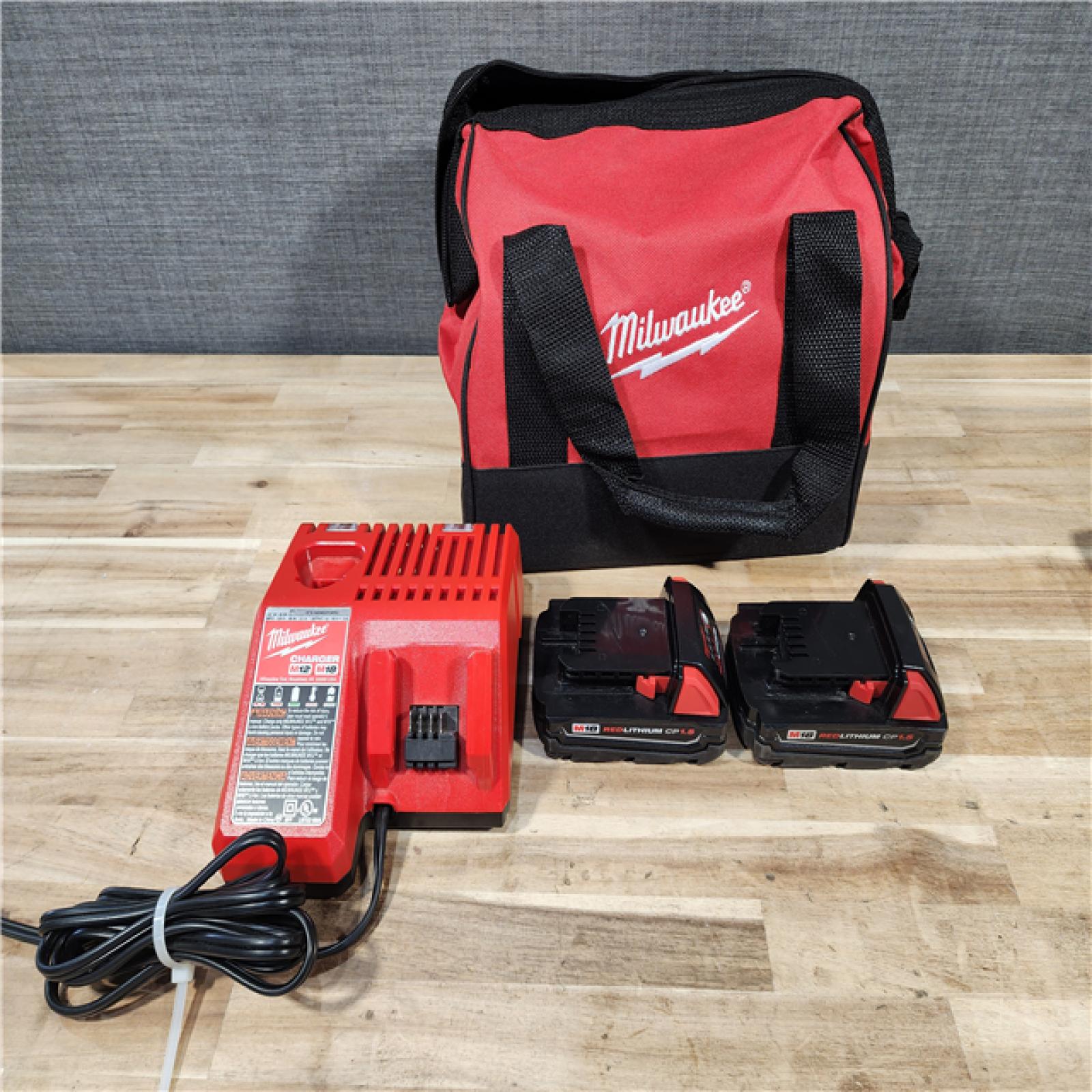 HOUSTON LOCATION - AS-IS Milwaukee  18V Lithium-Ion Cordless Drill Driver/Impact Driver Combo Kit