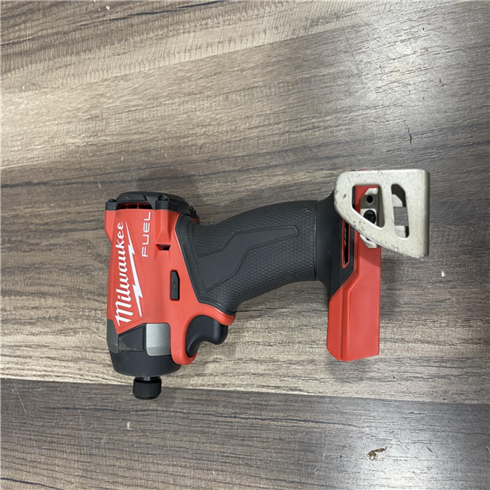 AS-IS Milwaukee FUEL 18V Lithium-Ion Brushless Cordless 1/4 in. Hex Impact Driver (Tool-Only)