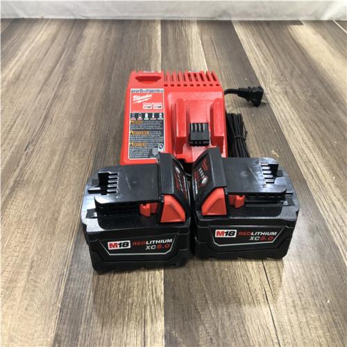 AS-IS Milwaukee 18-Volt Lithium-Ion XC Starter Kit with (2) 5.0Ah Batteries and Charger