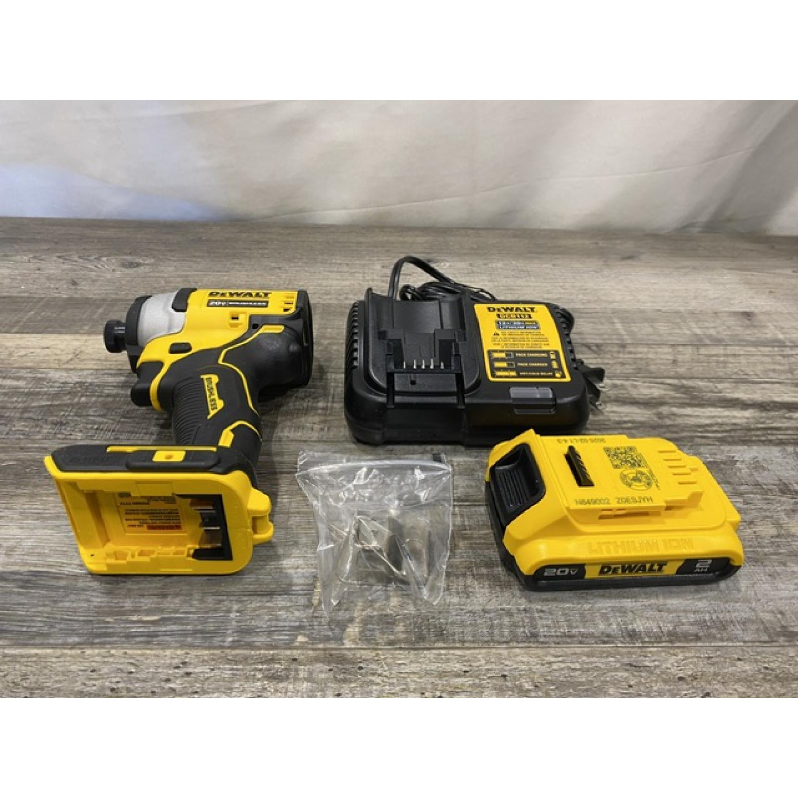 AS-IS DEWALT Atomic 20V Max Lithium-Ion Brushless Cordless Compact 1/4 in. Impact Driver Kit
