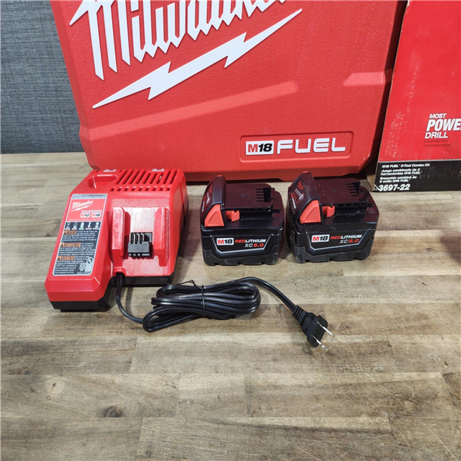HOUSTON LOCATION - AS-IS (APPEARS LIKE NEW) MILWAUKEE FUEL 18V Lithium-Ion Brushless Cordless Hammer Drill and Impact Driver Combo Kit (2-Tool) with 2 Batteries