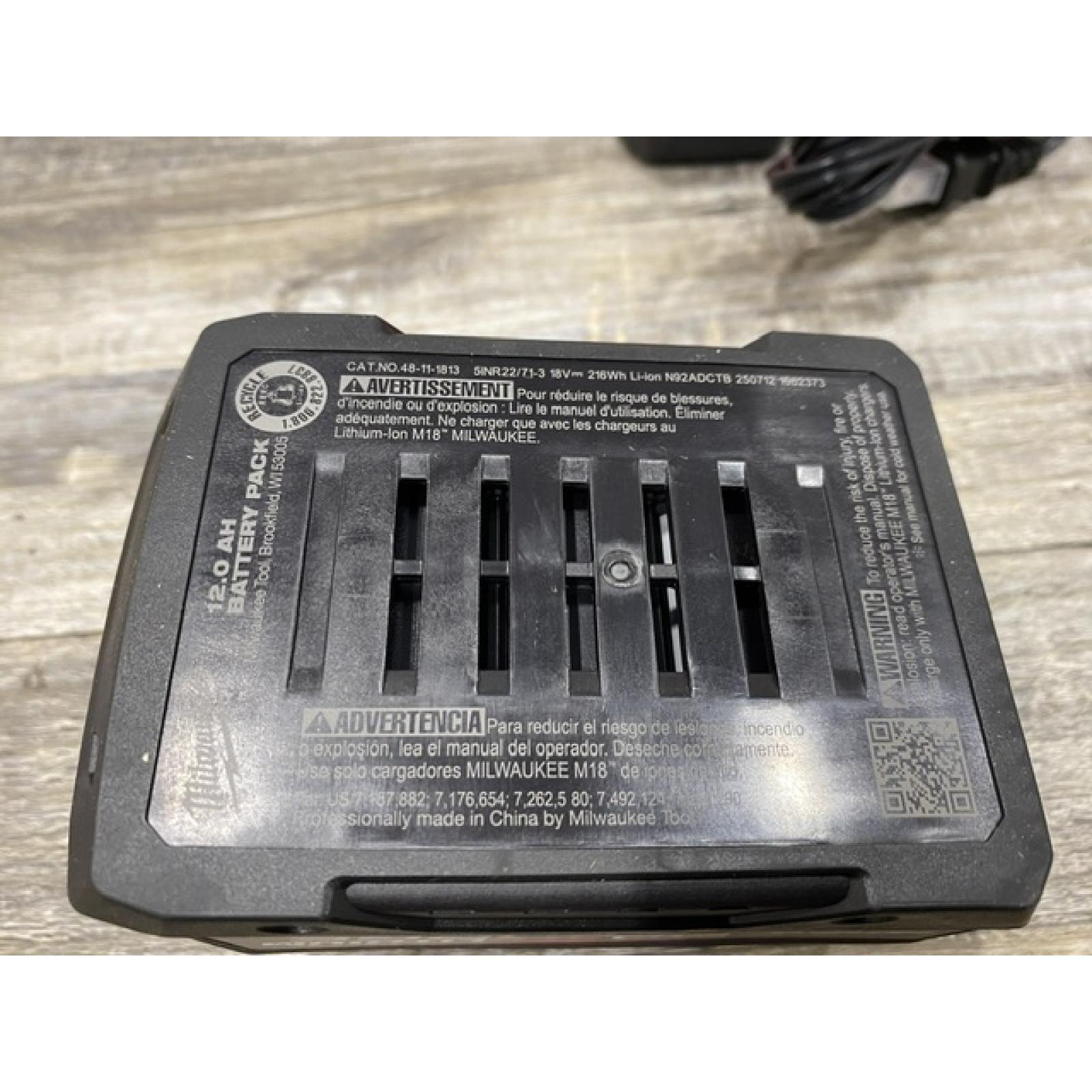 LIKE NEW - Milwaukee 18-Volt Lithium-Ion REDLITHIUM FORGE Starter Kit with 12. 0Ah Battery and Charger