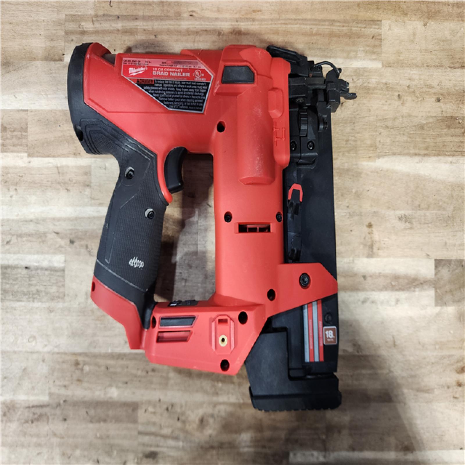 HOUSTON LOCATION - AS-IS Milwaukee FUEL 12-Volt Lithium-Ion Brushless Cordless 18-Gauge 1-1/2 in. Compact Brad Nailer (Tool Only)