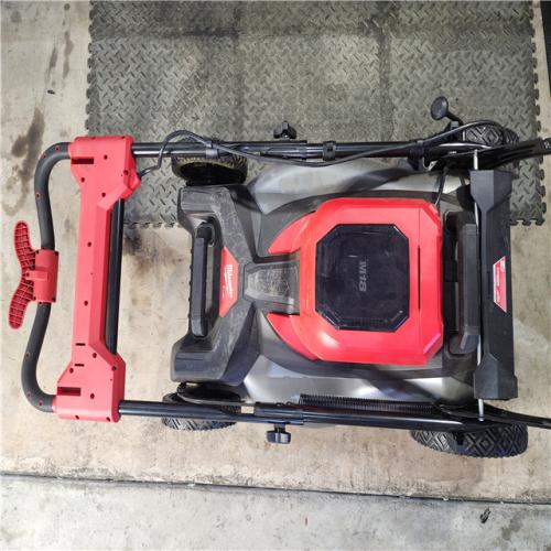HOUSTON LOCATION - AS-IS Milwaukee M18 FUEL Brushless Cordless 21 in. Walk Behind Dual Battery Self-Propelled Mower Kit W/ (2) HD12.0 BATTERY & RAPID CHARGER