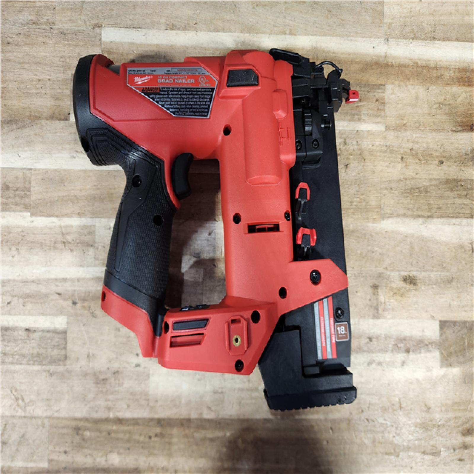 HOUSTON LOCATION - AS-IS Milwaukee FUEL 12-Volt Lithium-Ion Brushless Cordless 18-Gauge 1-1/2 in. Compact Brad Nailer (Tool Only)