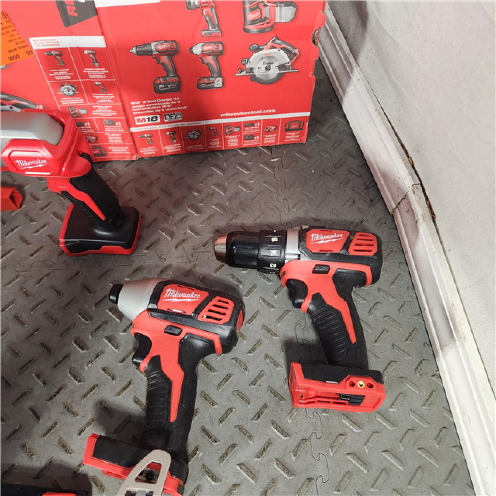 Houston Location - As-Is Milwaukee M18 18V Lithium-Ion Cordless Combo Kit (5-Tool) with 2-Batteries, Charger and Tool Bag - Appears IN NEW Condition
