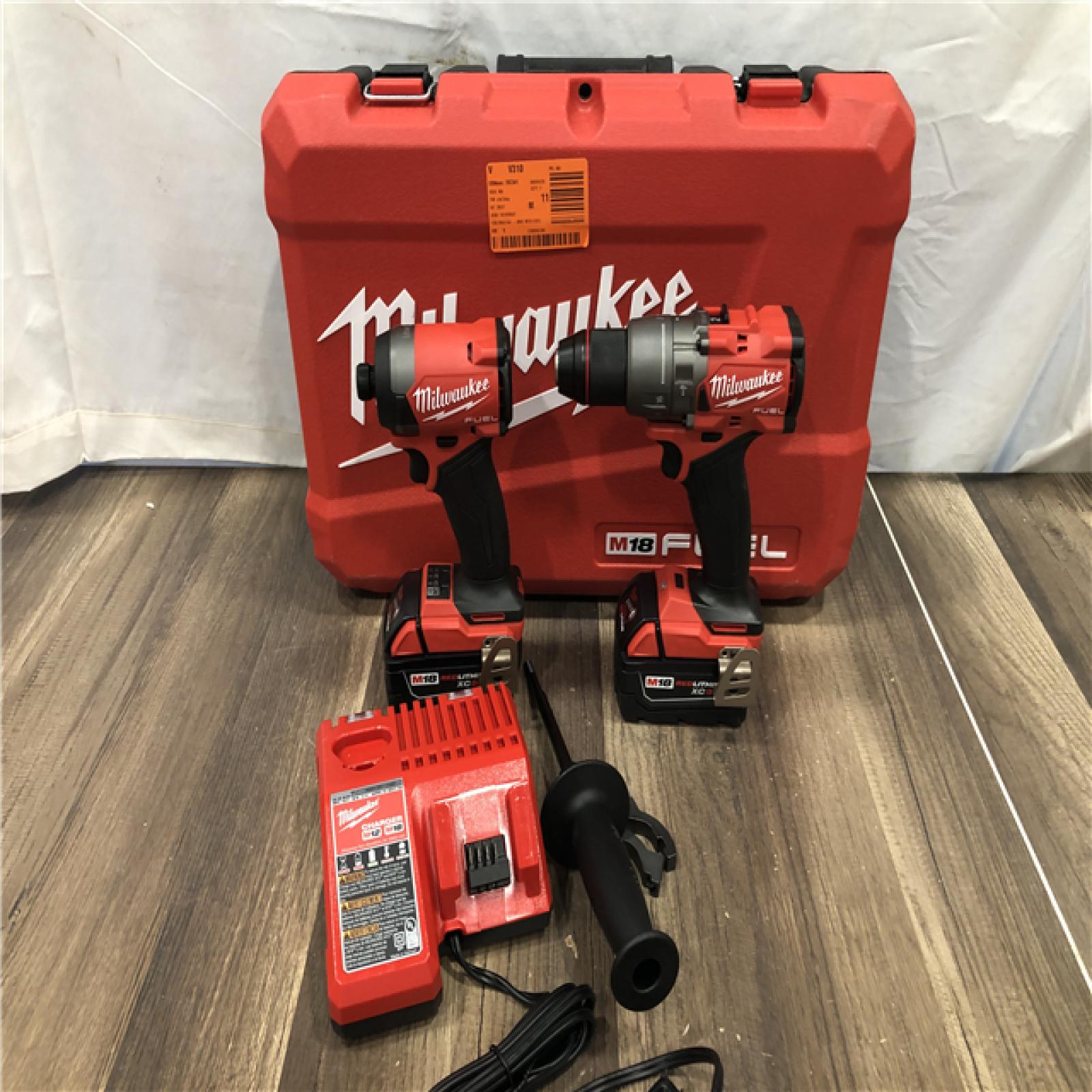 AS-IS Milwaukee FUEL 18V Lithium-Ion Brushless Cordless Hammer Drill and Impact Driver Combo Kit