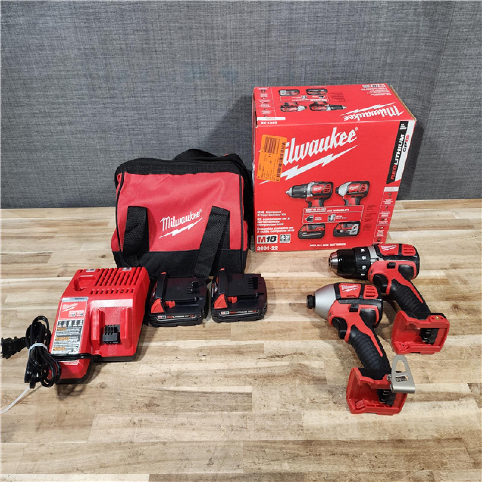 HOUSTON LOCATION - AS-IS Milwaukee 18V Lithium-Ion Cordless Drill Driver/Impact Driver Combo Kit