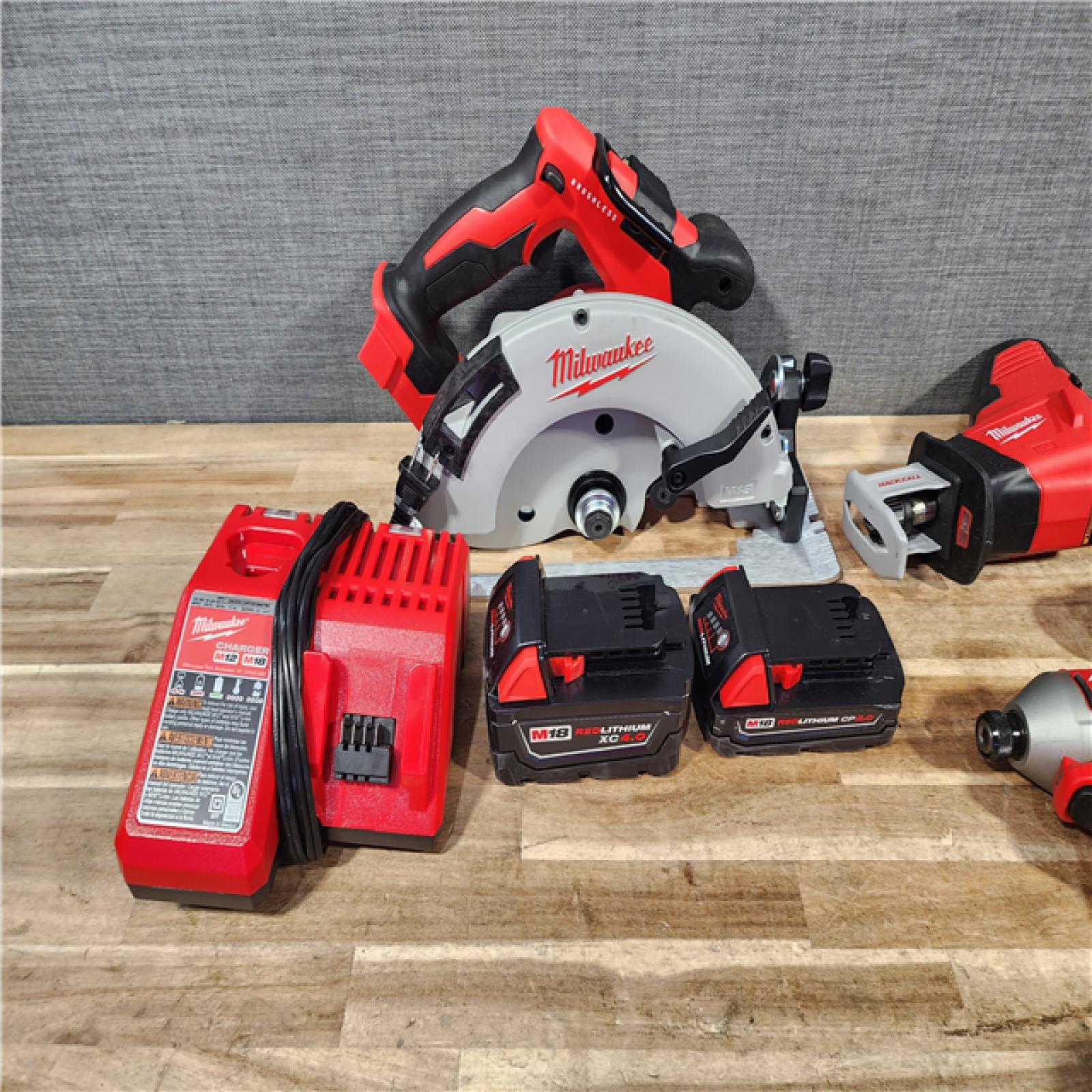 HOUSTON LOCATION - AS - IS Milwaukee 4 Tool Combo Kit W/ (2) Battery & Charger