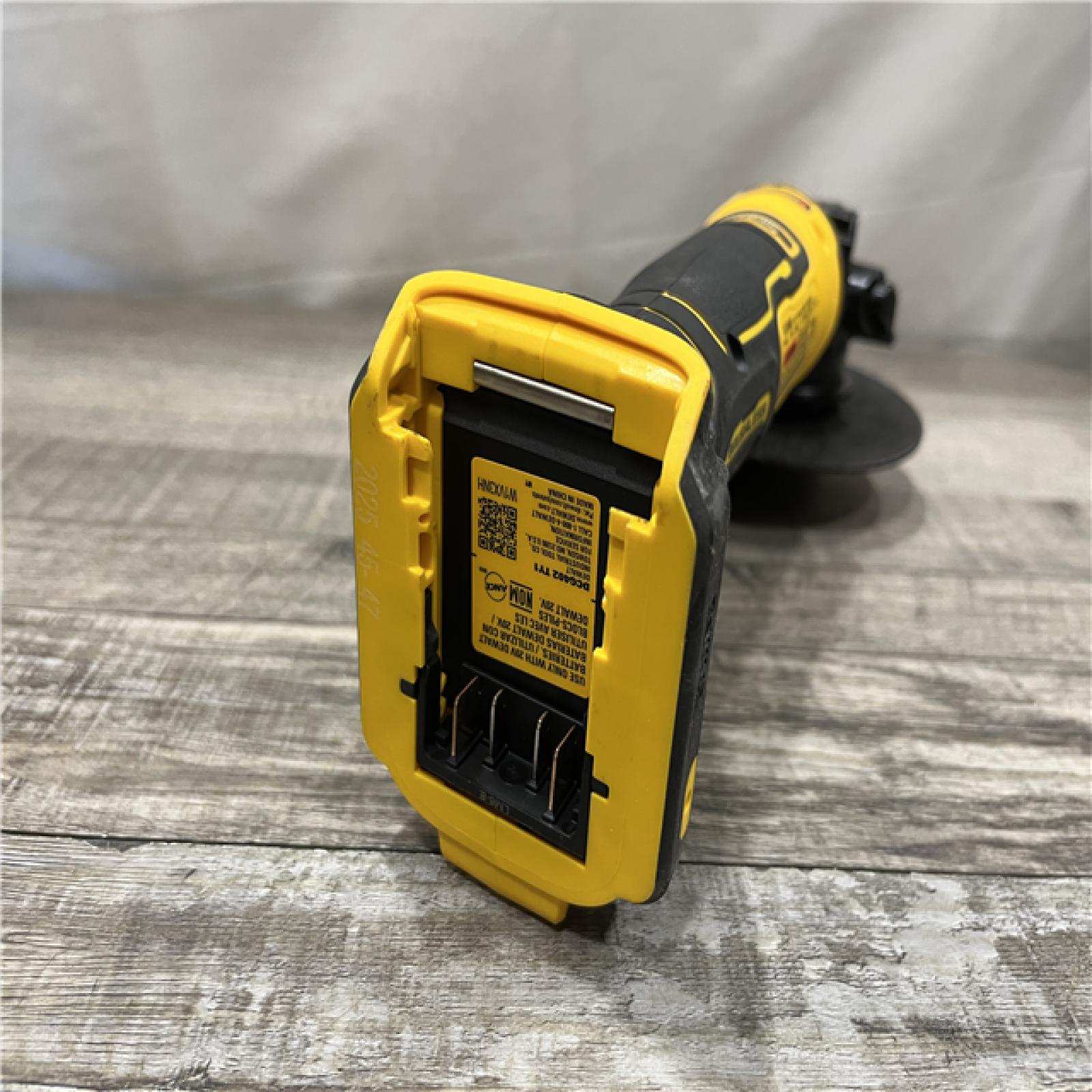AS-IS DEWALT ATOMIC 20V MAX Cordless 4-1/2 in. Angle Grinder with Paddle Switch (Tool Only)