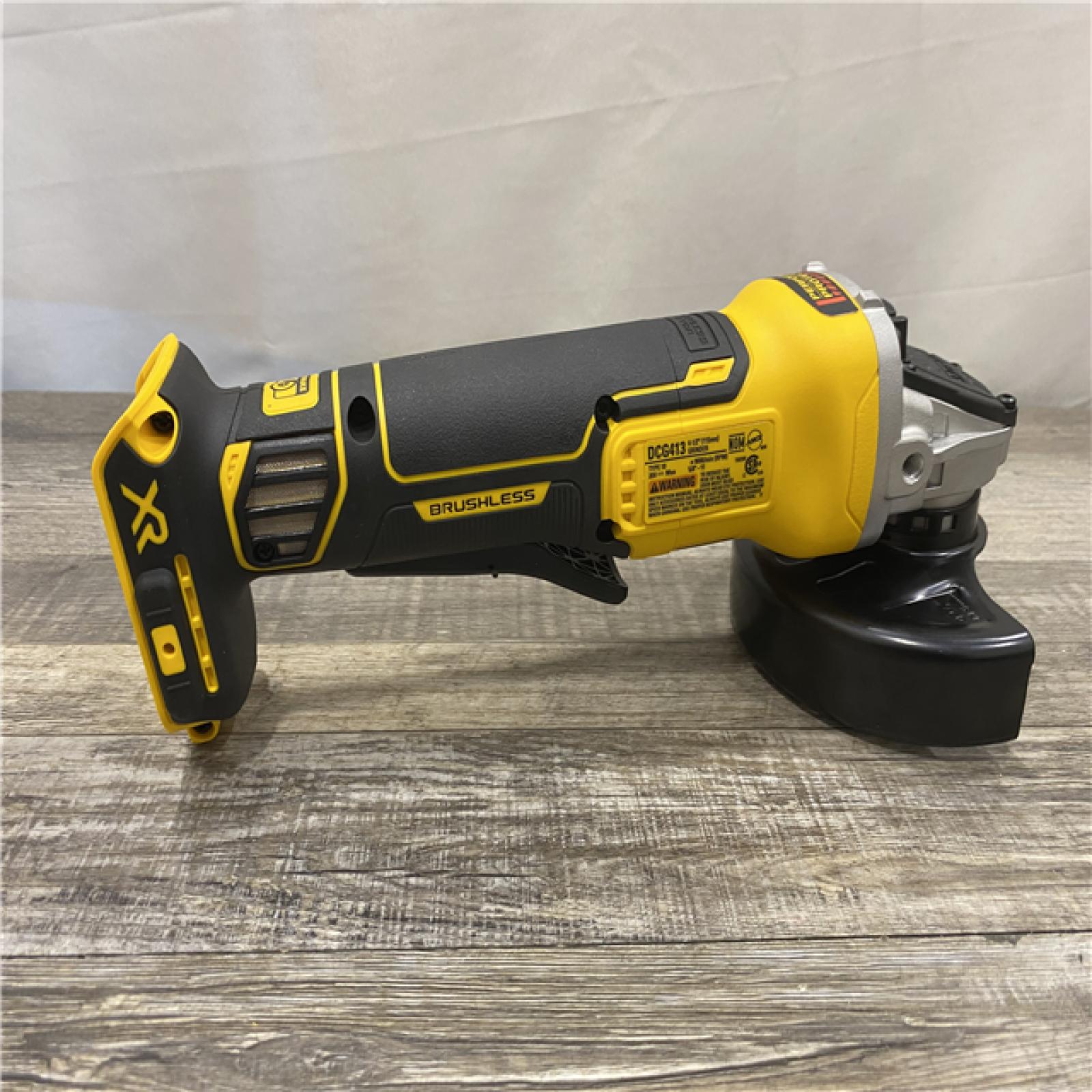 AS-IS DEWALT 20V MAX XR Cordless Brushless 4.5 in. Paddle Switch Small Angle Grinder with Kickback Brake (Tool Only)