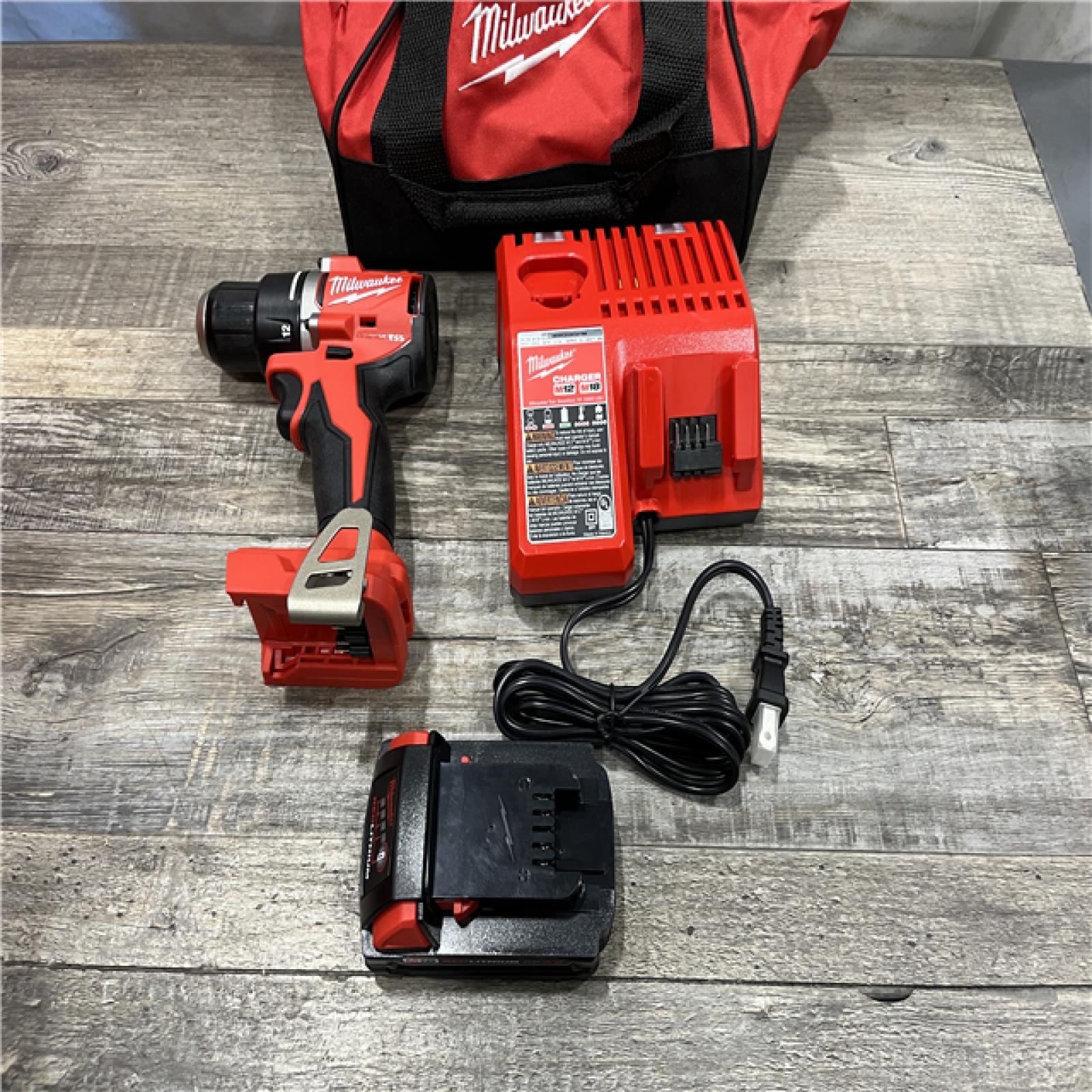 AS-IS Milwaukee 18V Lithium-Ion Brushless Cordless 1/2 in. Compact Drill/Driver with kit