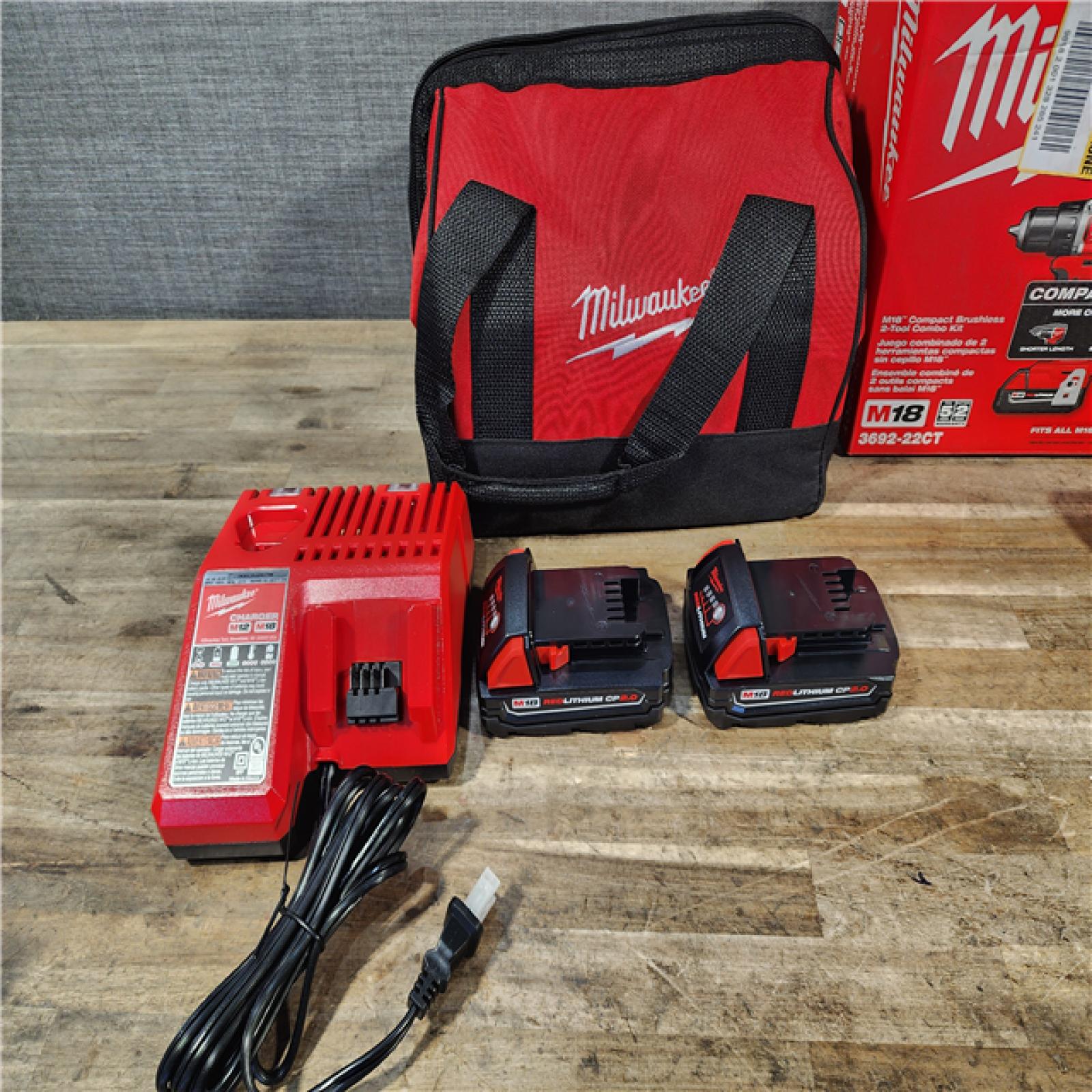 HOUSTON LOCATION - AS-IS Milwaukee M18 18V Lithium-Ion Brushless Cordless Compact Drill/Impact Combo Kit (2-Tool) W/(2) 2.0 Ah Batteries  Charger & Bag