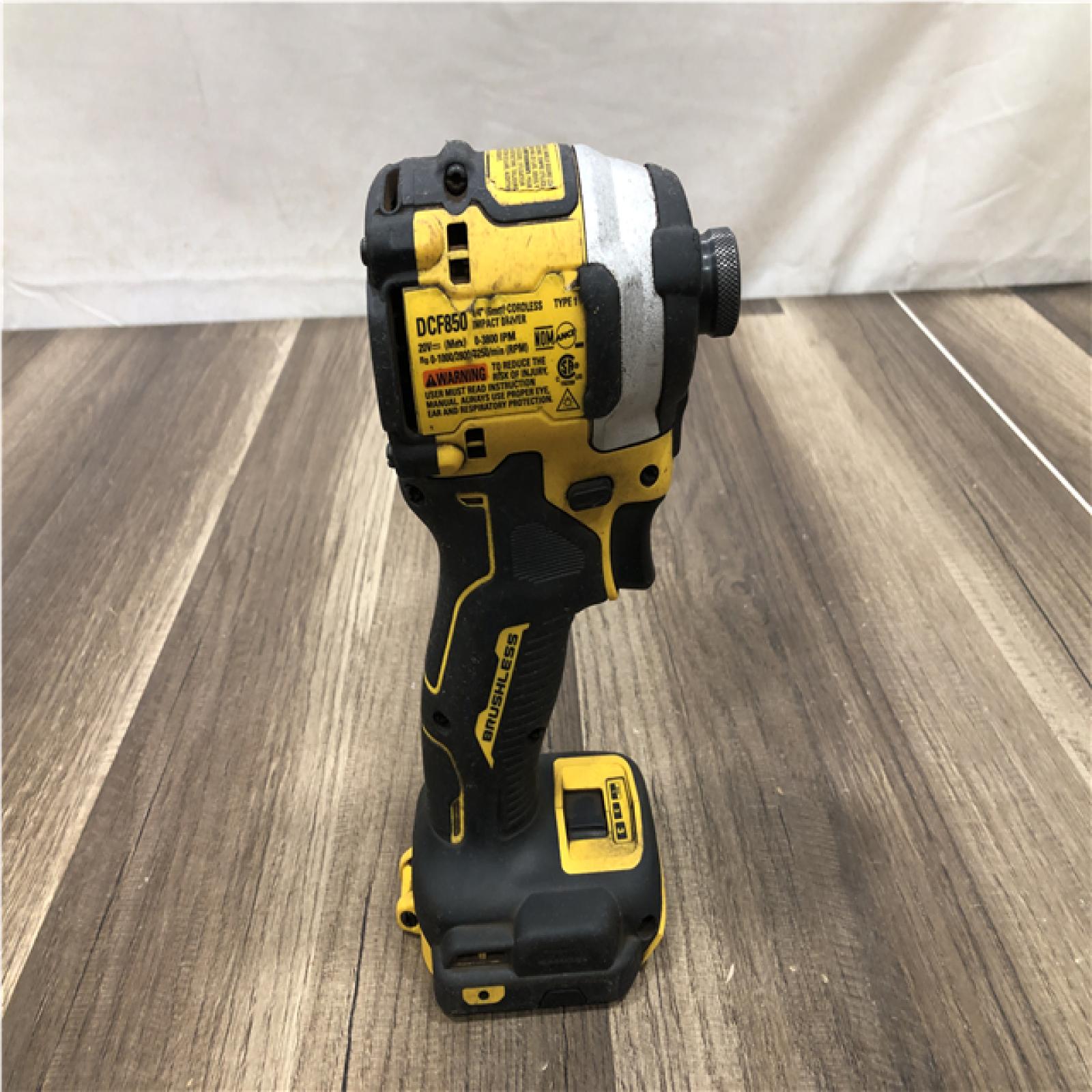 AS-IS DEWALT ATOMIC 20V MAX Cordless Brushless Compact 1/4 in. Impact Driver (Tool Only)