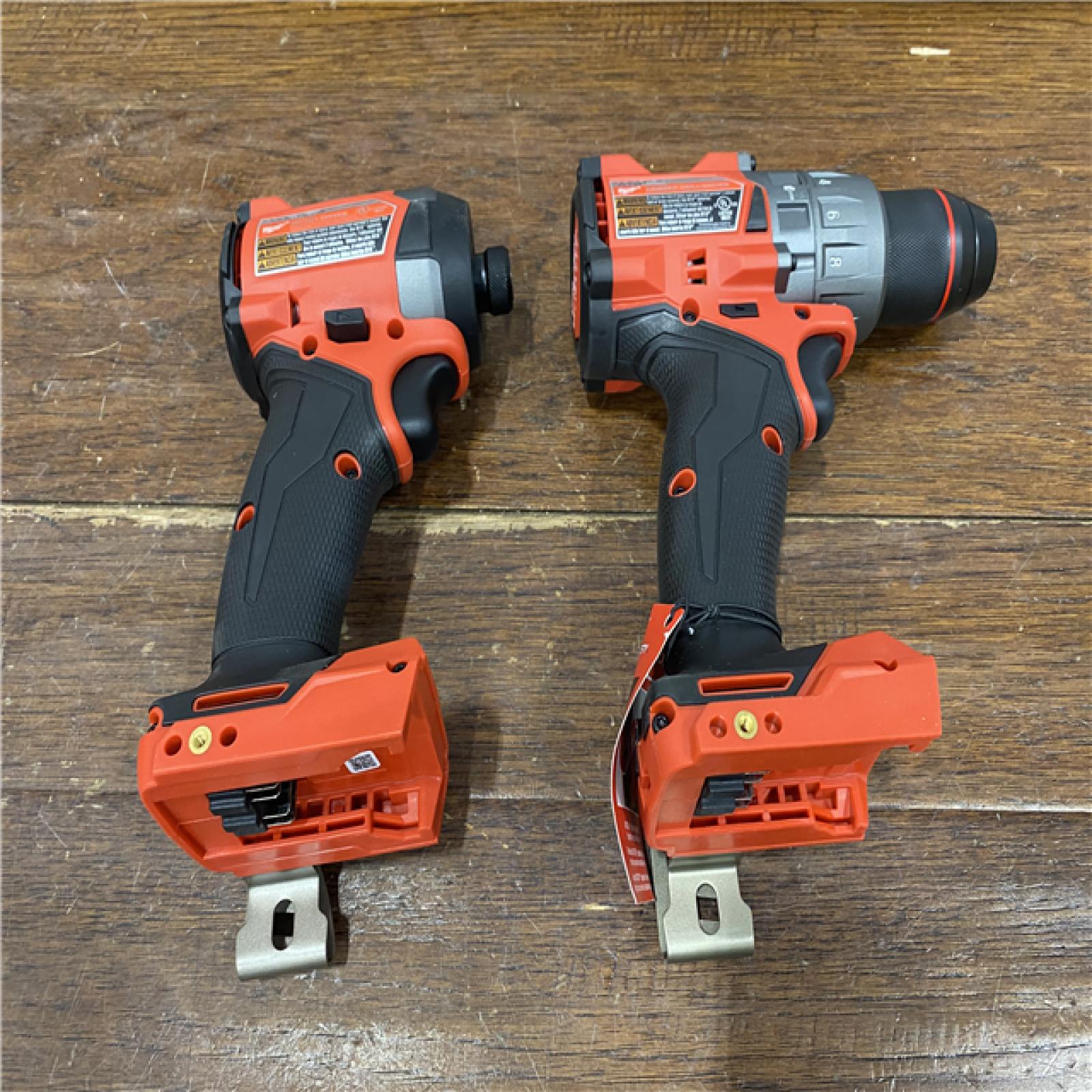 AS-IS MILWAUKEE M18 FUEL 18V Lithium-Ion Brushless Cordless Hammer Drill and Impact Driver Combo Kit (2-Tool) with 2 Batteries