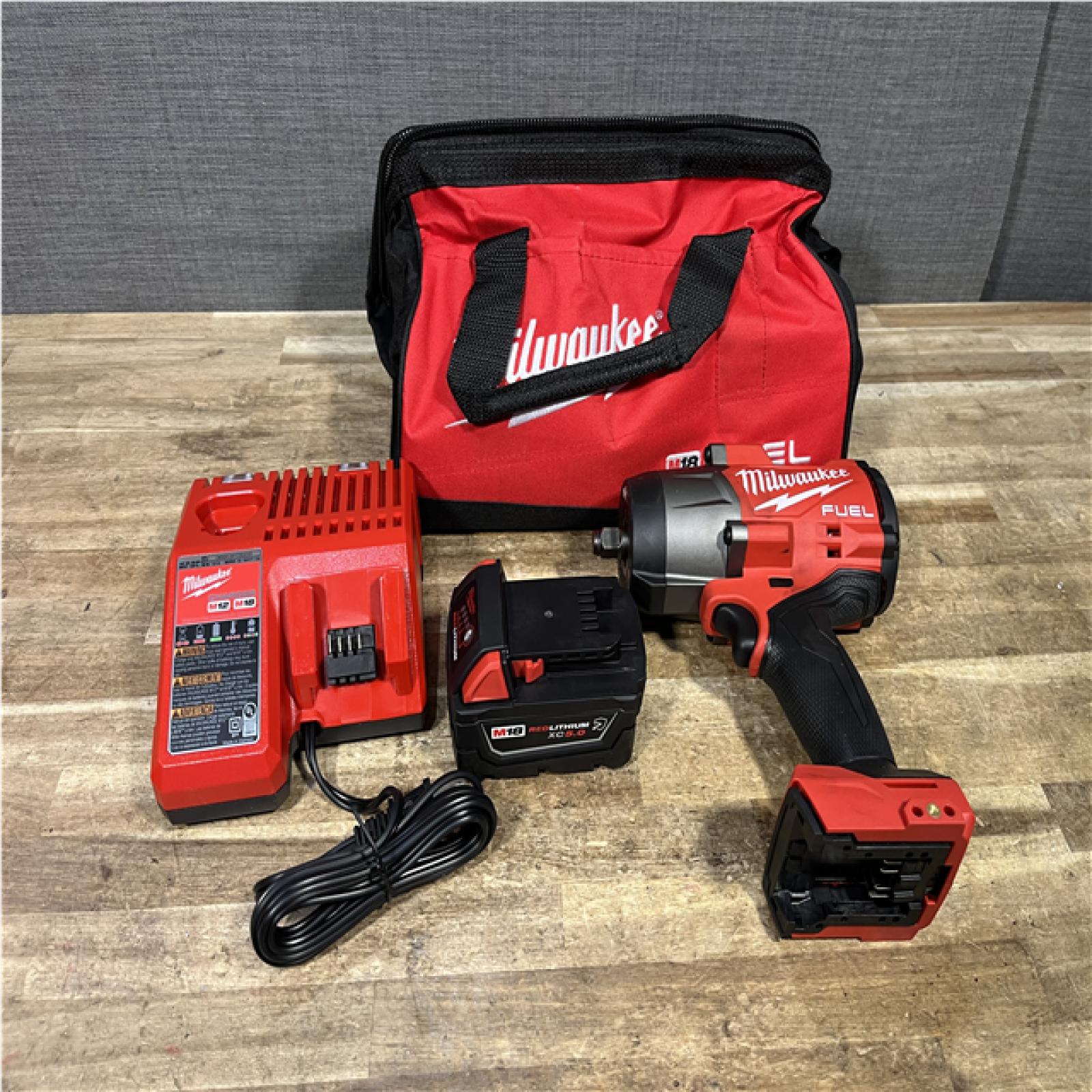 Houston Location AS-IS Milwaukee FUEL 18V Lithium-Ion Brushless Cordless 1/2 in. Impact Wrench w/Friction Ring Kit