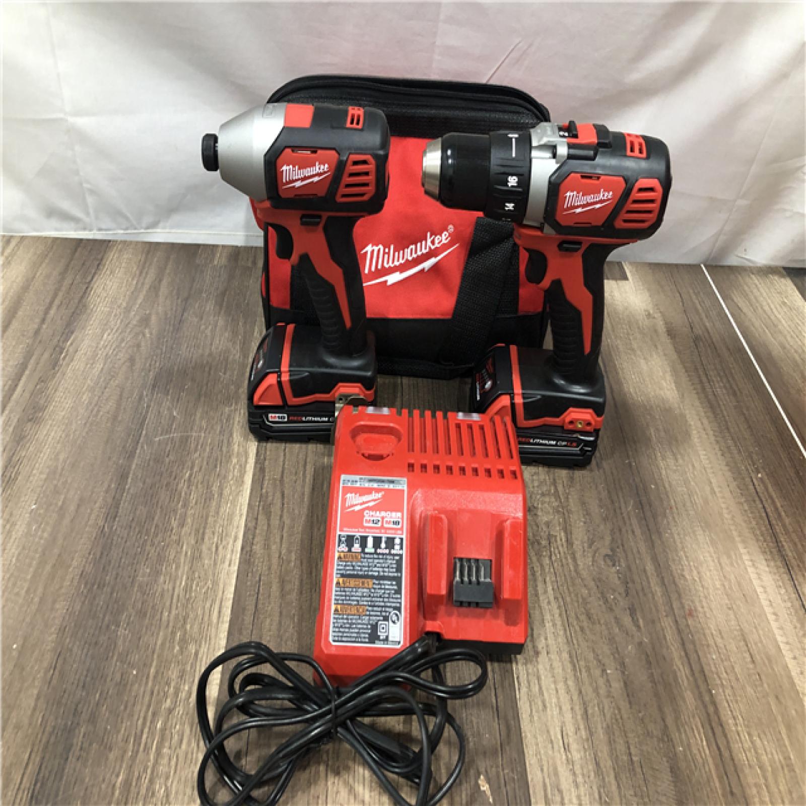 AS-IS Milwaukee M18 18V Lithium-Ion Cordless Drill Driver/Impact Driver Combo Kit