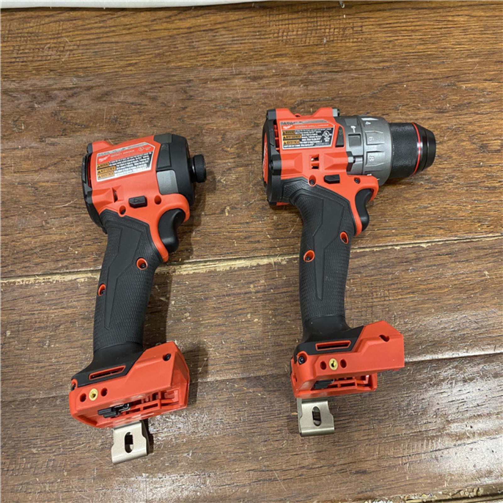 AS-IS MILWAUKEE M18 FUEL 18V Lithium-Ion Brushless Cordless Hammer Drill and Impact Driver Combo Kit (2-Tool) with 2 Batteries