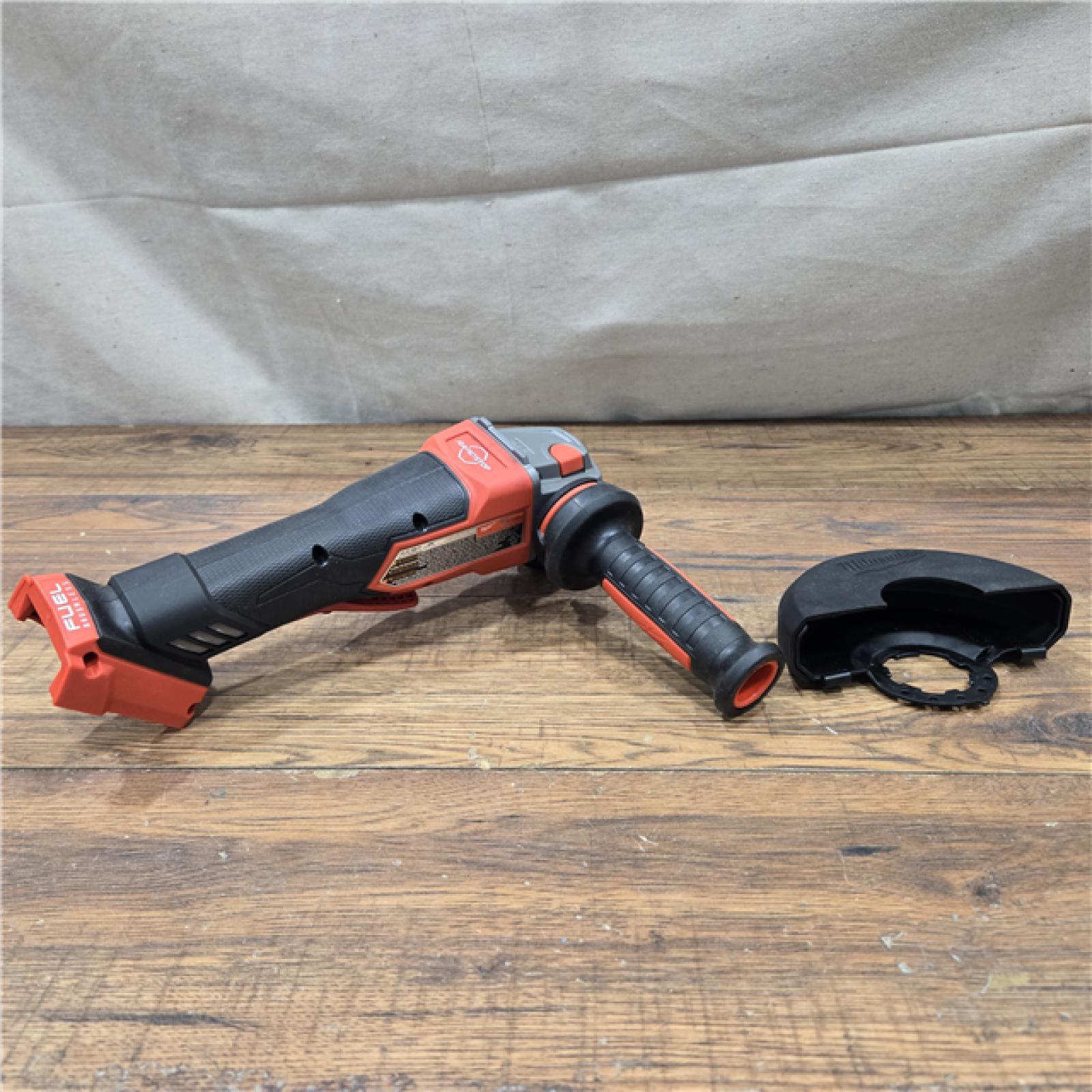 AS-IS Milwaukee 2880-20 M18 FUEL 18-Volt Lithium-Ion Brushless Cordless 4-1/2 in./5 in. Grinder W/Paddle Switch (Tool-Only)