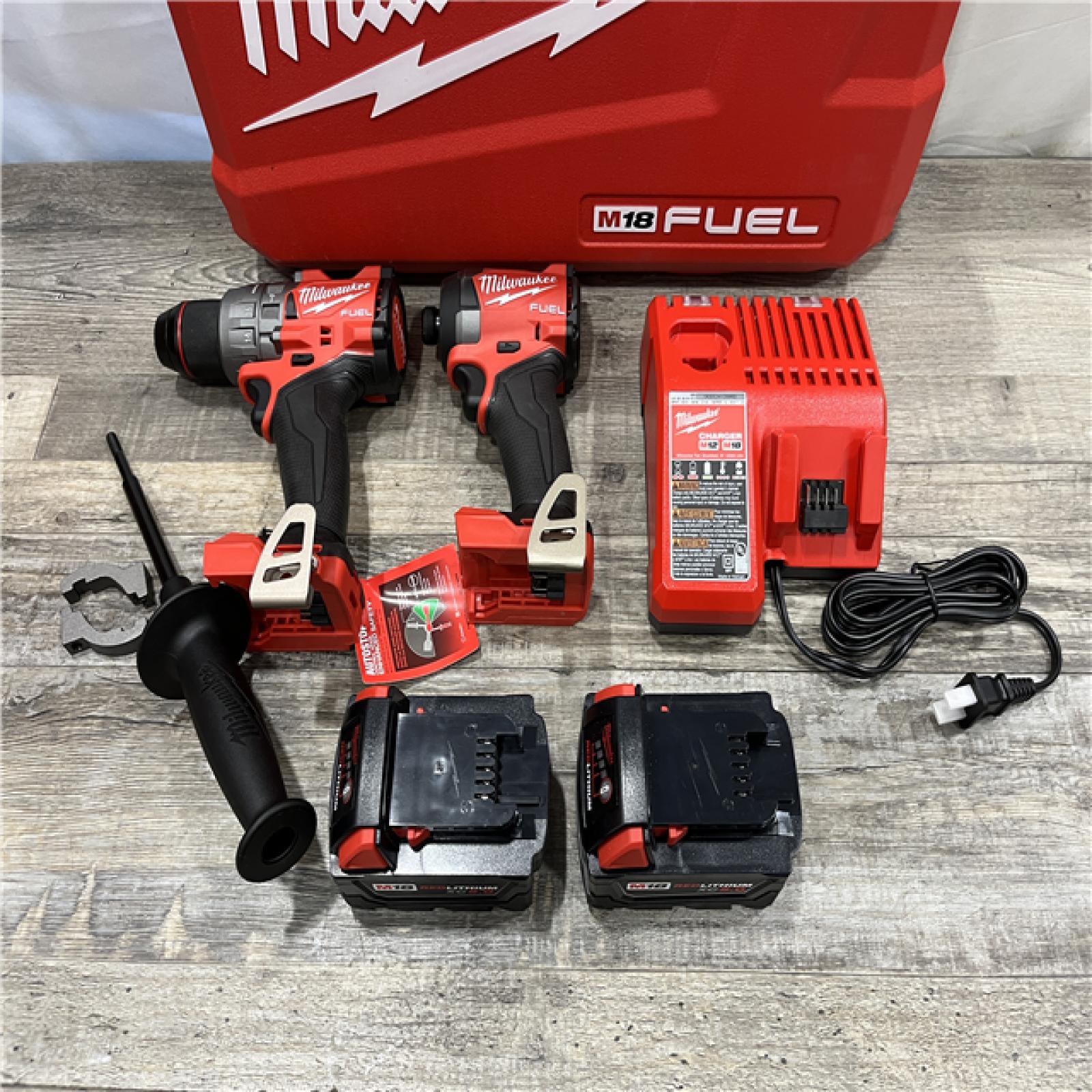 AS-IS Milwaukee FUEL 18V Lithium-Ion Brushless Cordless Hammer Drill and Impact Driver Combo Kit