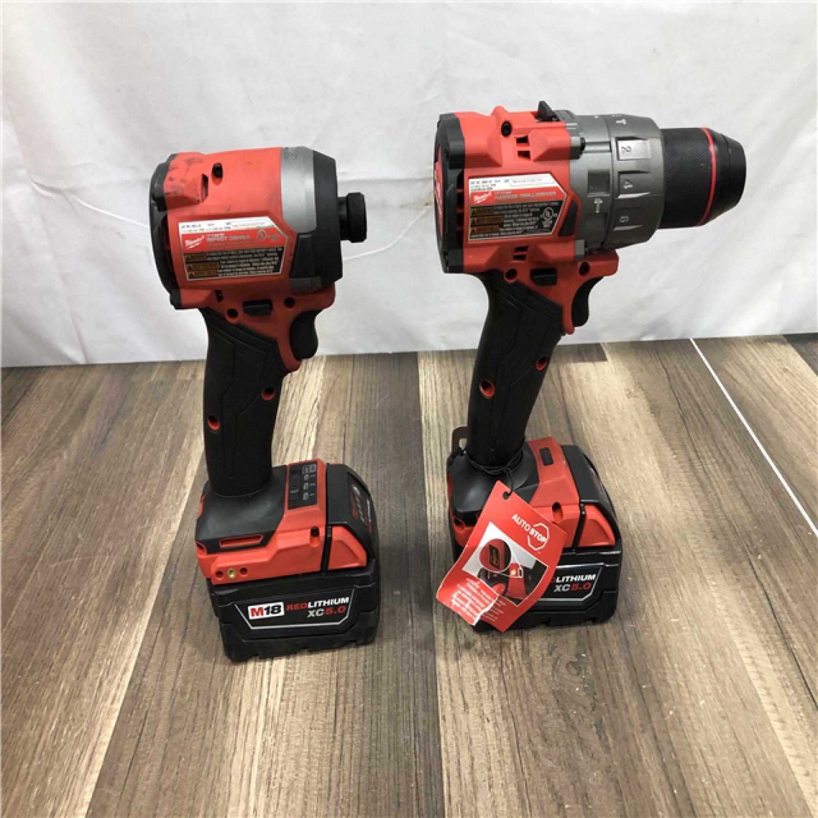 AS-IS Milwaukee  FUEL 18V Lithium-Ion Brushless Cordless Hammer Drill and Impact Driver Combo Kit